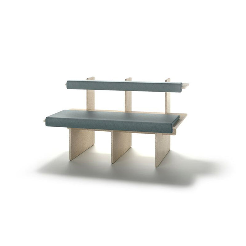 The Pip bench by Richard Lampert features a wooden frame with a light blue cushioned seat and backrest. Its modern, minimalist design offers customizable seating with clean lines and a geometric shape, perfectly contrasting against the white background.