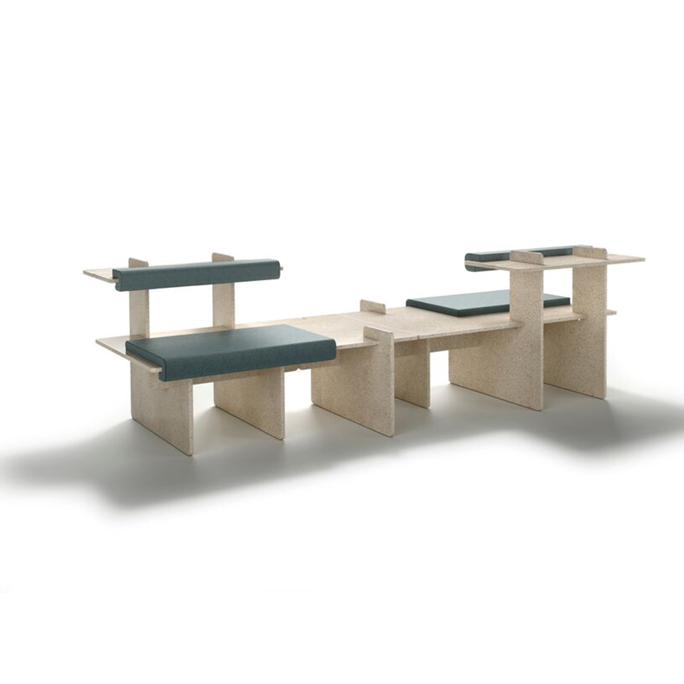 The Pip by Richard Lampert is a modern, minimalist bench featuring beige panels and blue-gray cushions. With flat surfaces and perpendicular supports on a white background, this customizable seating adapts perfectly to any space.