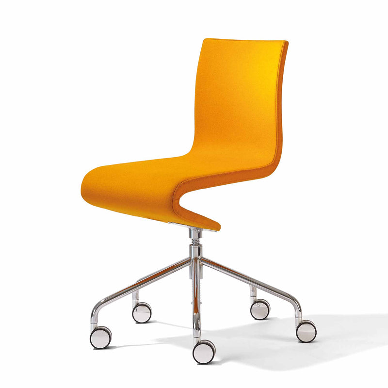 The Seesaw Task Chair by Richard Lampert is an orange ergonomic chair with a sleek, curved design and no armrests. It features cushioned seating, a backrest, and a silver metal base with five caster wheel legs for easy movement, ensuring comfort and support throughout the workday.