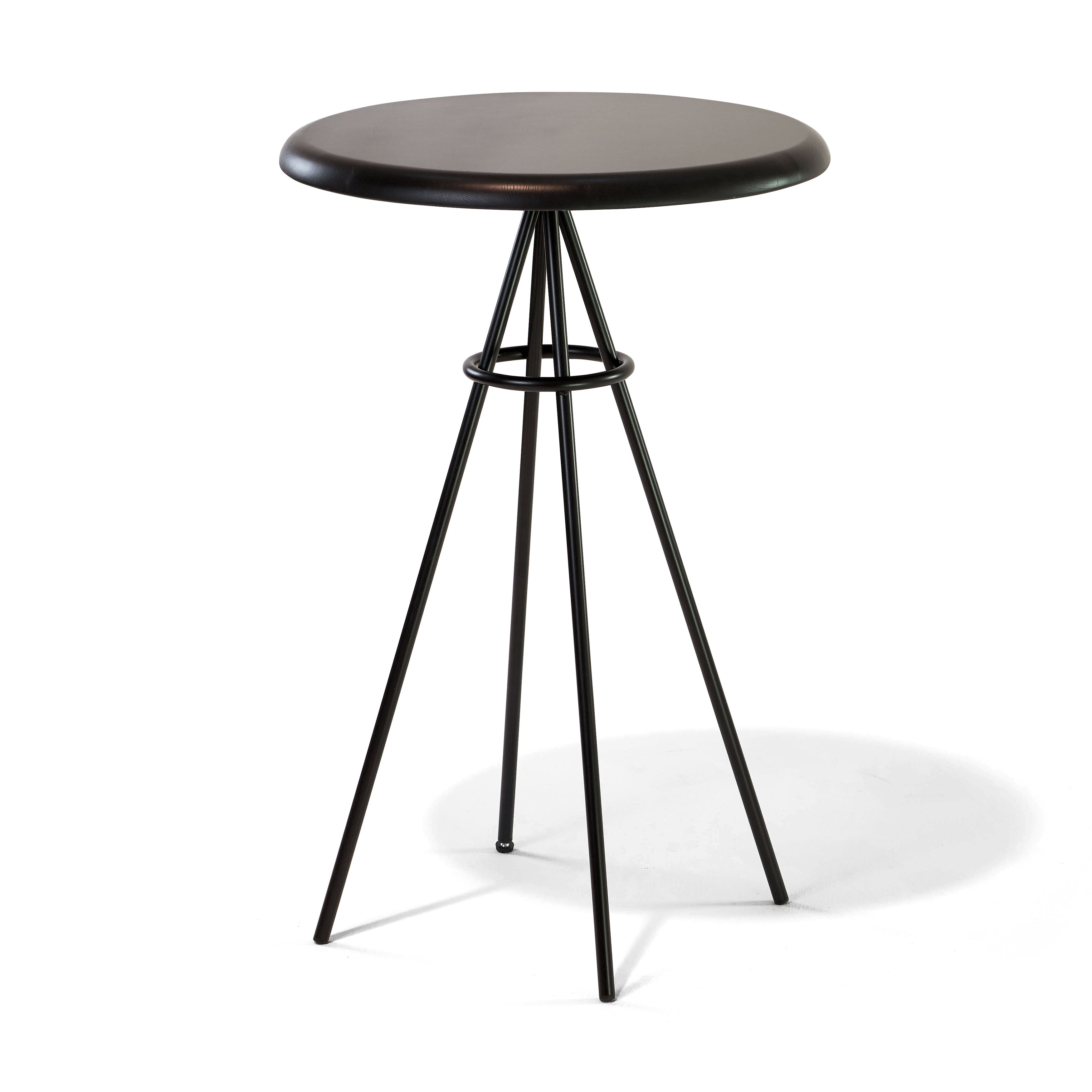 The Tom Bar Table by Richard Lampert features a sleek, modern design with a smooth top and sturdy black frame on thin metal tripod legs, perfect for contemporary settings. Enhanced by lighting to cast subtle shadows on its white backdrop, it epitomizes minimalistic style.