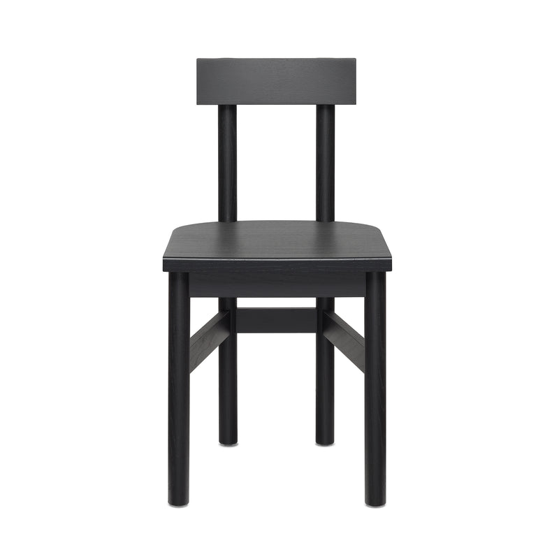 The SX01 GAMAR Chair by E15 is a simple black wooden chair with a straight backrest and four round legs, photographed against a white background.