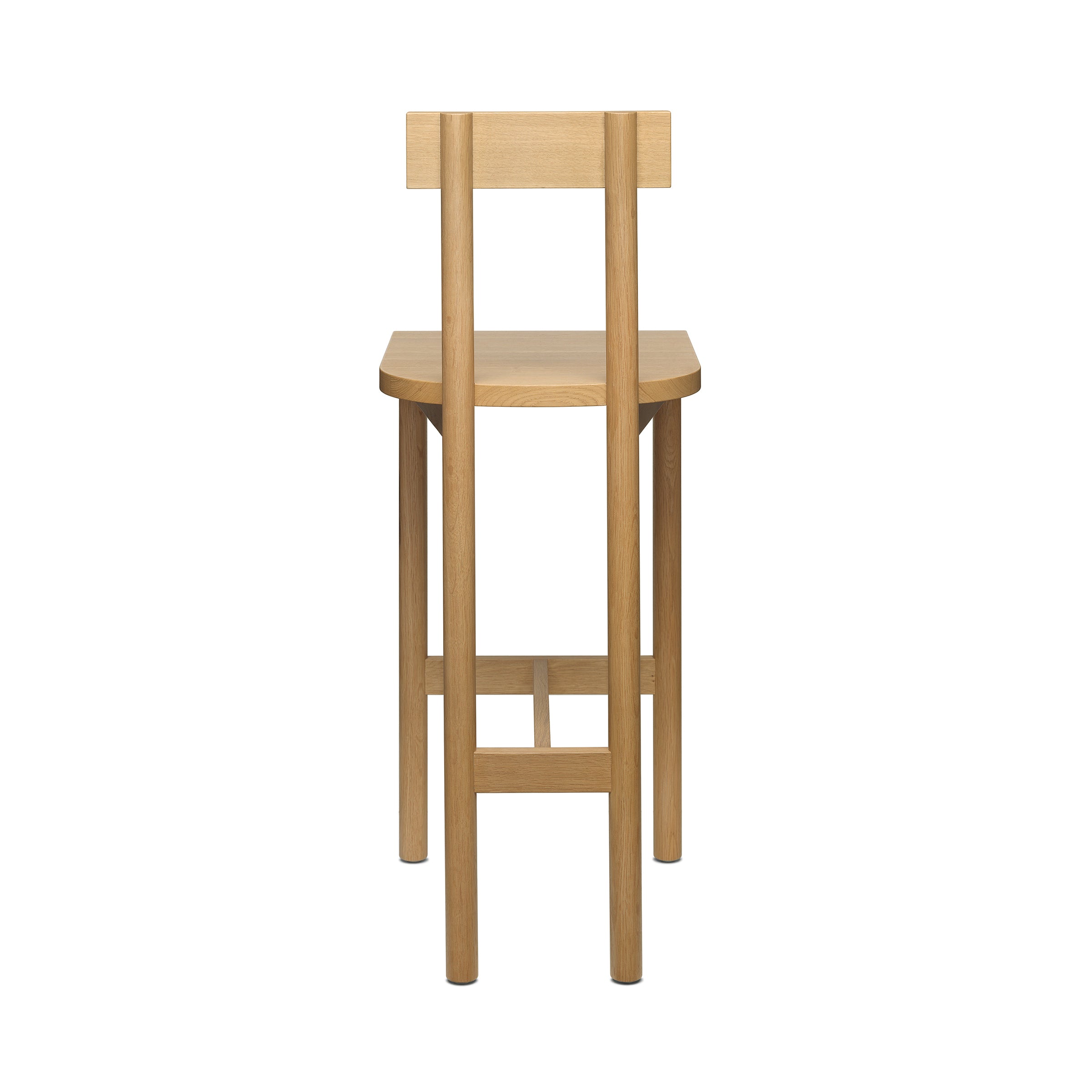 The SX02 GAMAR BARSTOOL by E15 features a minimalist design with a flat backrest, four straight legs, and crafted from European oak. The visible wood grain enhances its natural look while showcasing the elegant backrest and legs.