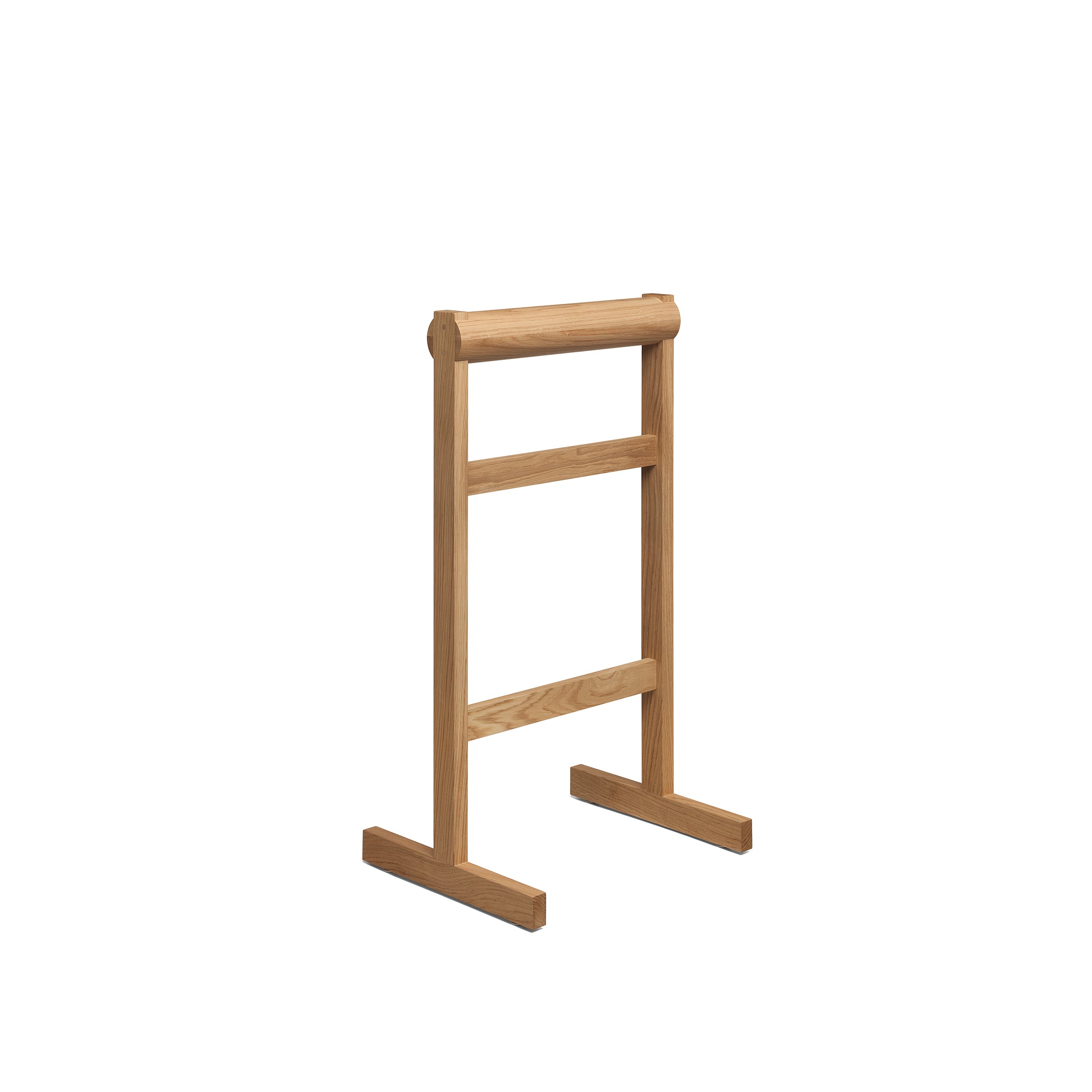 The E15 SX03 GAMAR Wardrobe Stand showcases a simple yet modern rustic design with two horizontal bars on a rectangular frame and base, crafted from light European oak. Its elegantly set against a plain white background.