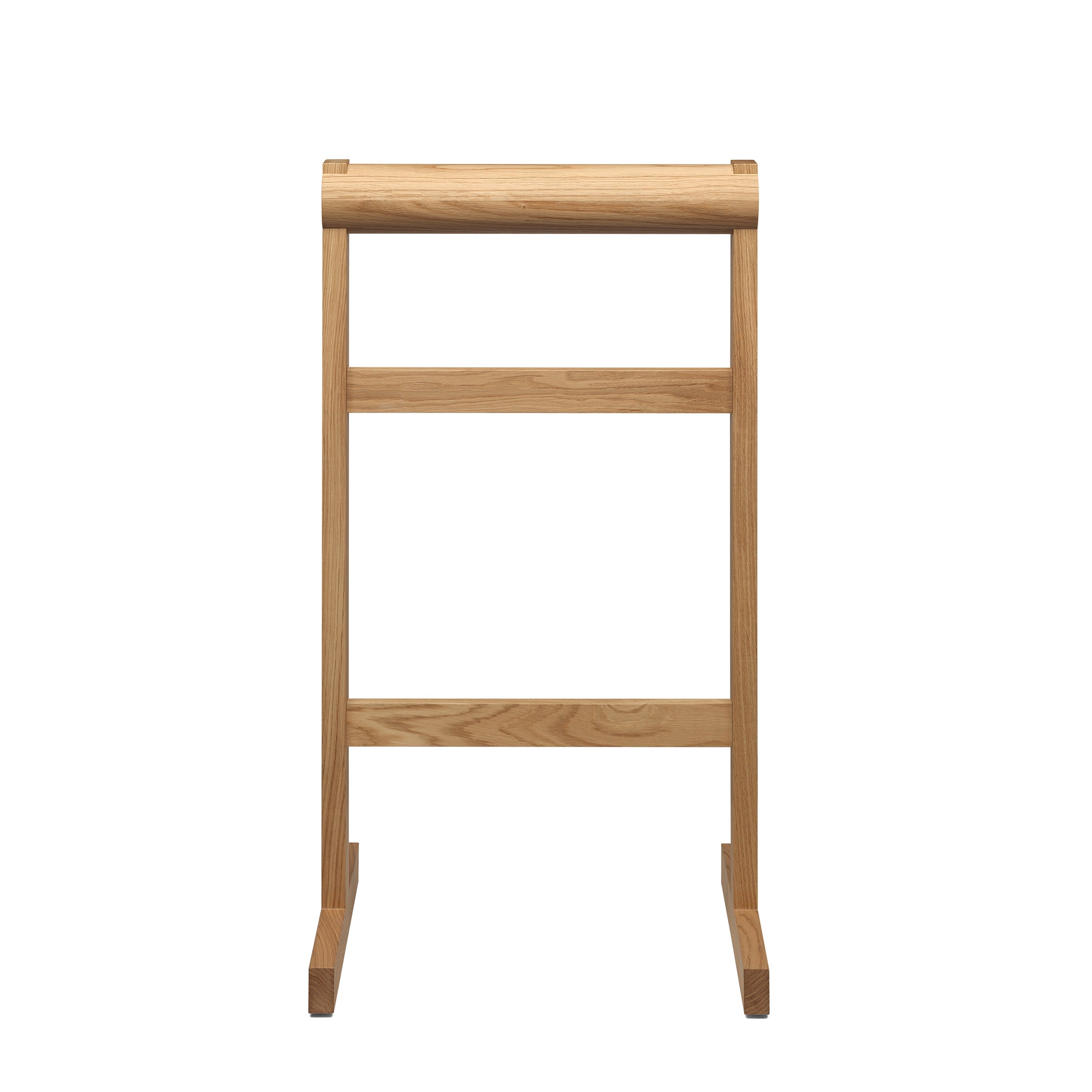The SX03 GAMAR Wardrobe Stand by E15 features a minimalist design with three horizontal bars and two vertical supports. Made from European oak, it has a light, natural wood finish and stands elegantly on any flat surface.