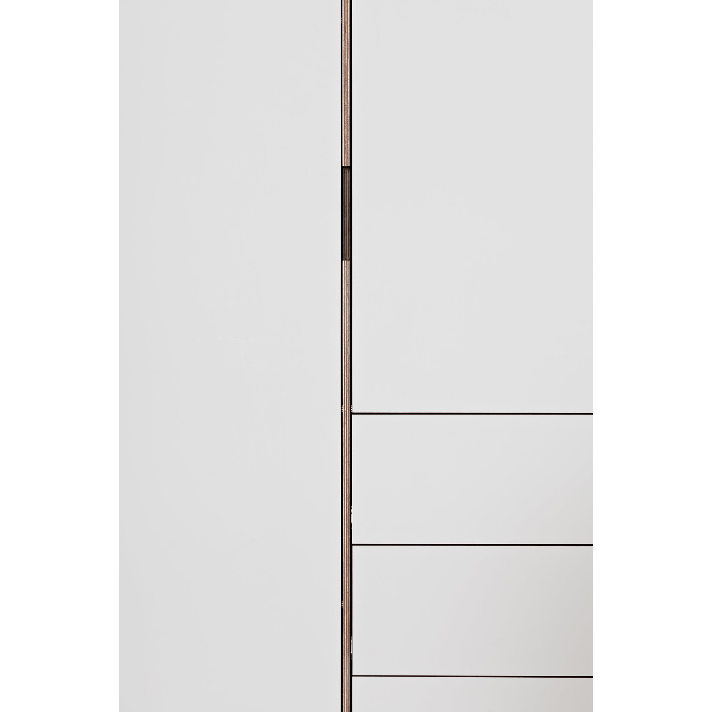 Introducing the Sanktjohanser Metrum Storage, a minimalist, made-to-measure cabinet featuring a white left door and drawer-suggesting horizontal lines on the right. With its sleek design and light color palette, it offers clean lines for a modern touch.