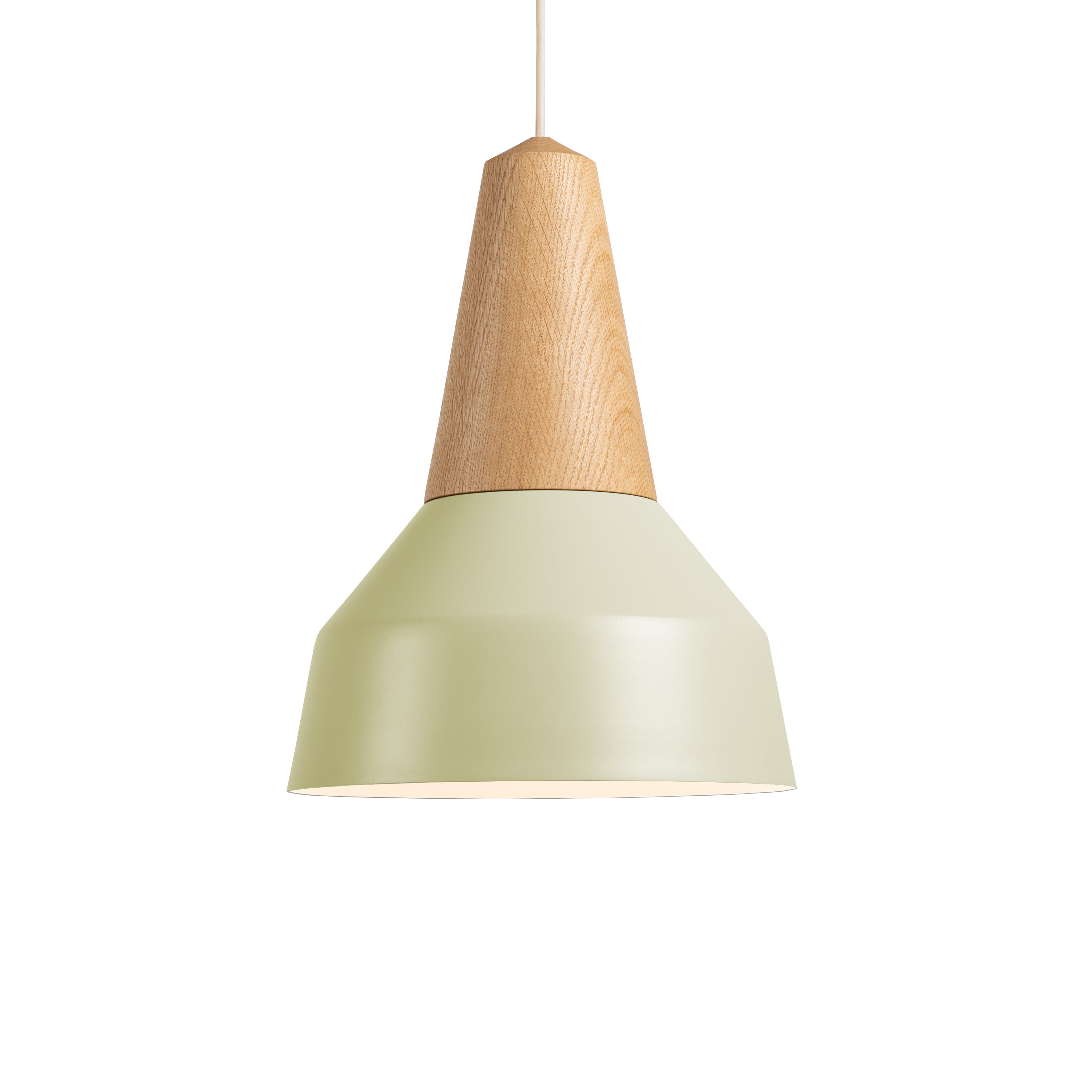 The Eikon Basic Pistache by Schneid is a modern pendant light featuring a smooth, pale green metal shade with a conical, light brown certified wood top. It hangs elegantly from a white cord, offering a striking contrast between the soft green and warm wooden tones.