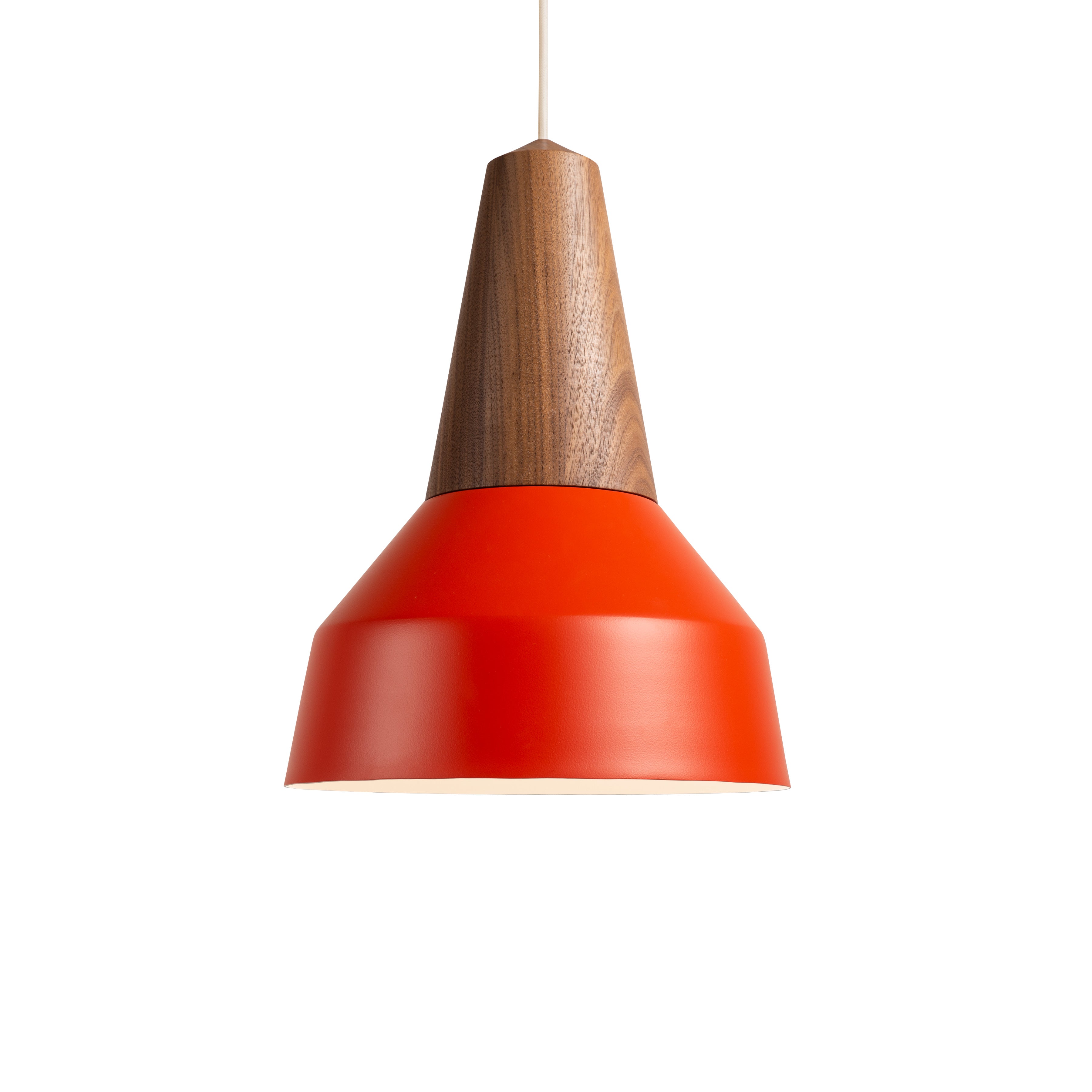 The Schneid Eikon Basic Poppy Red lamp boasts a modern pendant design with a smooth, conical certified wood top and a wide, cylindrical red shade. It hangs elegantly from a thin cord against a plain white background, highlighting its refined construction.