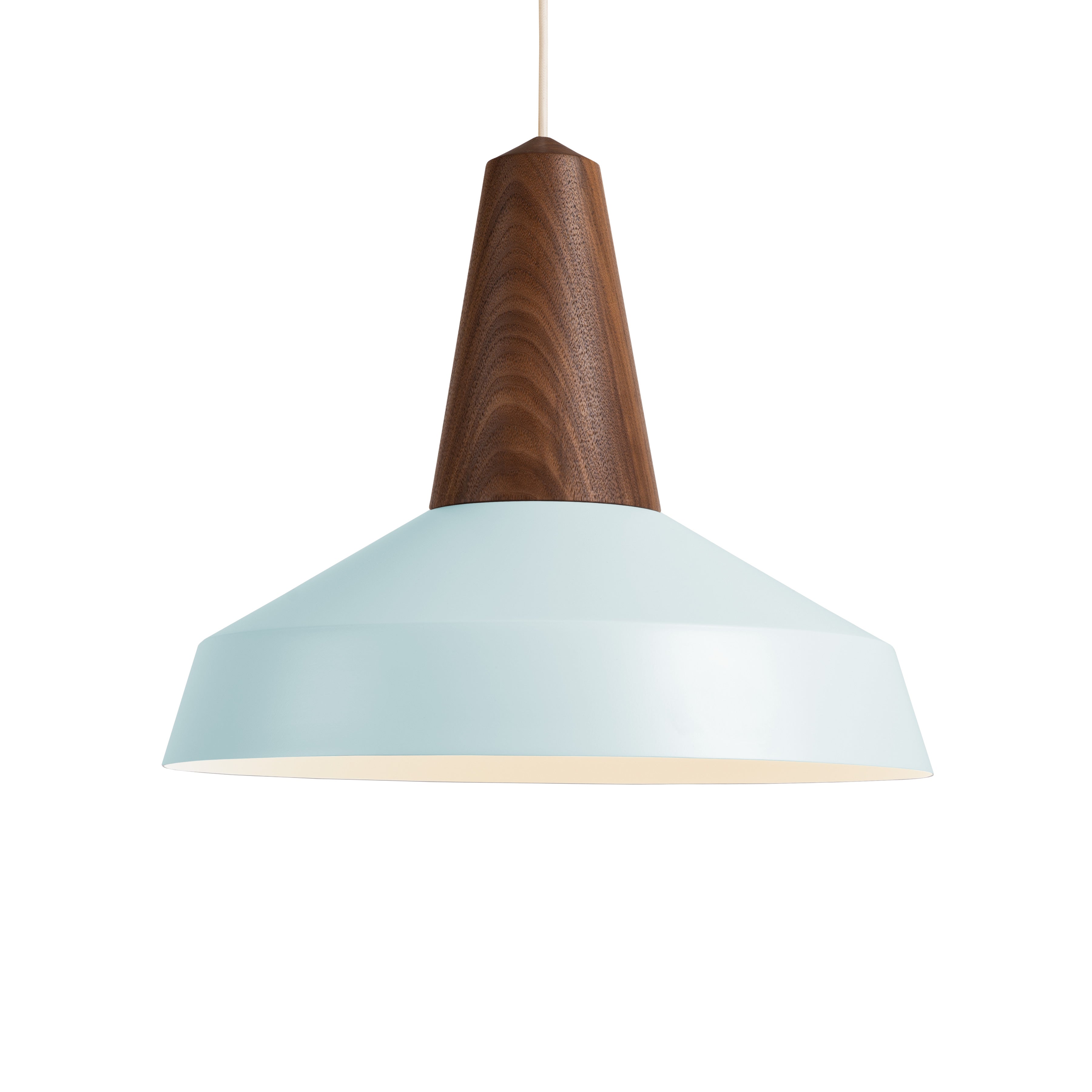 The Schneid Eikon Circus Sky Blue pendant light combines a sky blue, wide conical shade with a wooden, tapered top for a modern industrial vibe. It hangs from a white cord against an all-white backdrop.