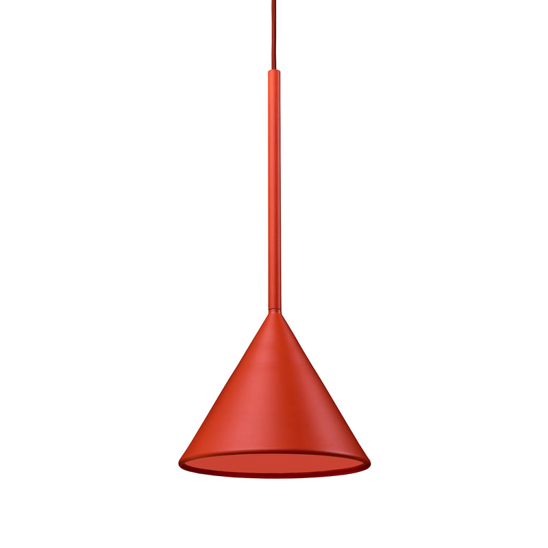 The Figura Cone Burnt Orange by Schneid features a cone-shaped luminaire with a thin vertical rod, combining a sculptural design with burnt orange color against a white background.