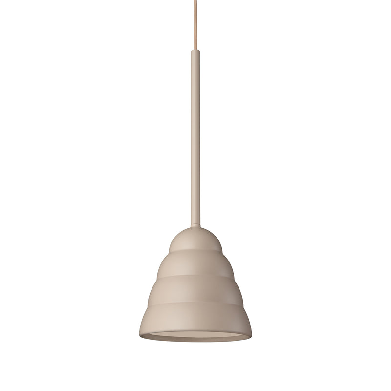 The Schneid Figura Stream Desert Sand is a minimalist luminaire with a smooth, beige, tiered-plaster shade resembling a beehive shape, suspended from a slender cord.