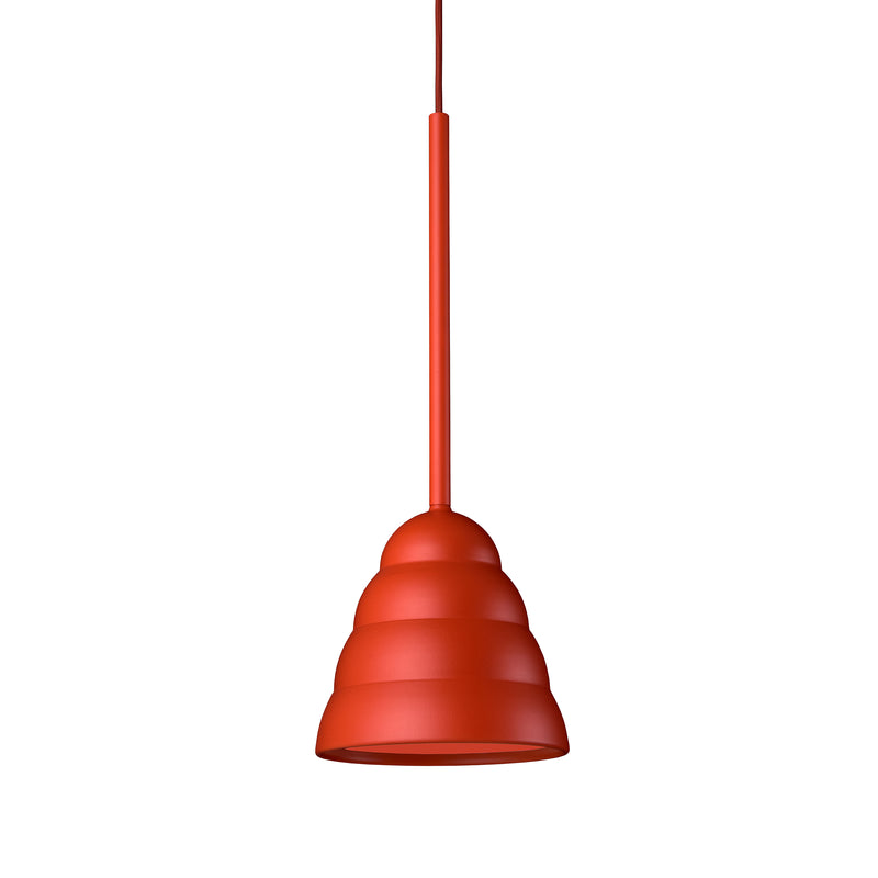 The Figura Stream Burnt Orange by Schneid is a cone-shaped pendant light with a ribbed design, hanging from a single cord against a white background. Its minimalist style and smooth texture make it ideal for those seeking modern, industrial luminaires.