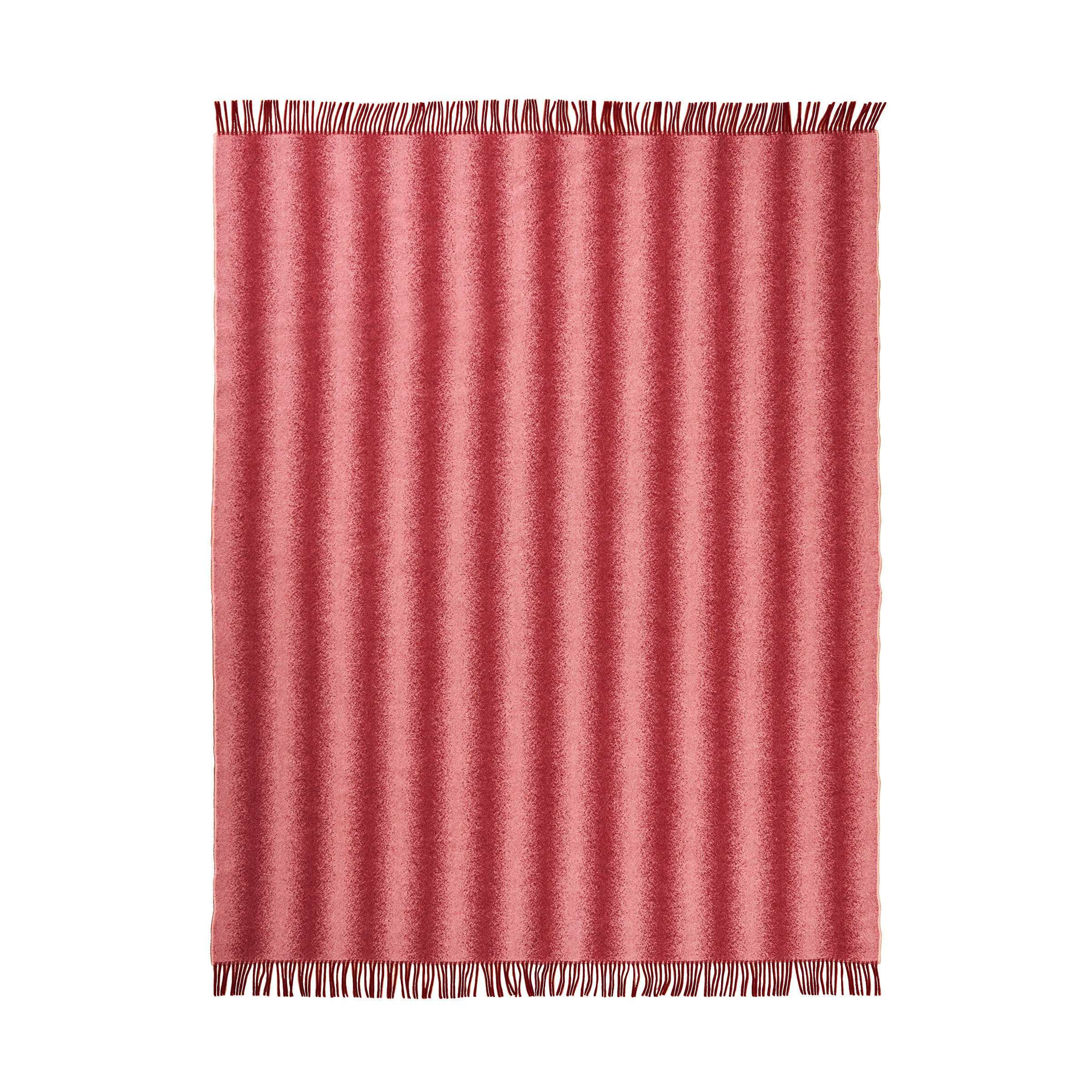 The pink Tide Blanket by Schneid is a 100% wool woven throw with a textured ridged pattern and fringes on top and bottom edges, offering a simple yet elegant design. Soft and plush, its perfect for cozying up in its atmospheric nature.