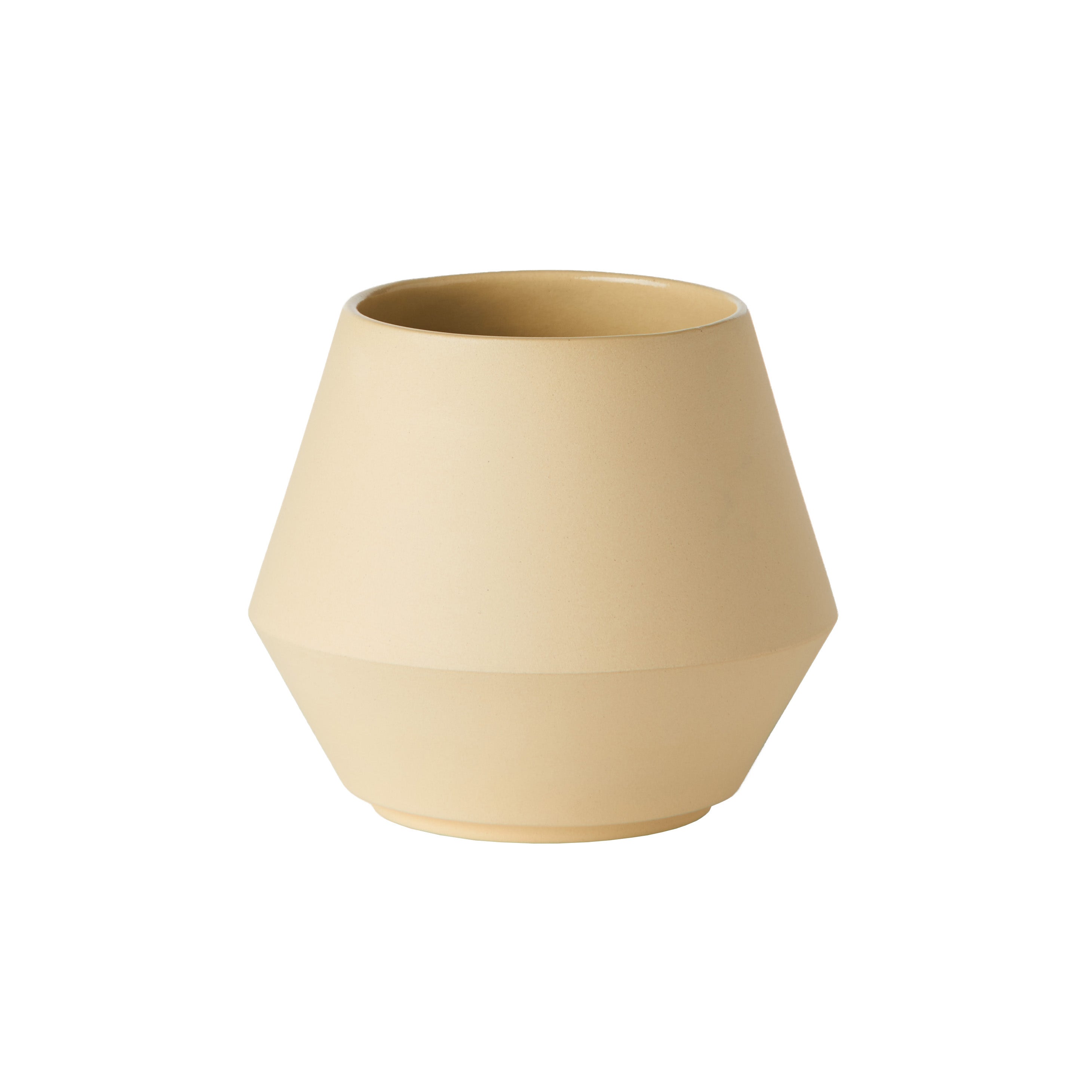 The Unison Sugar Bowl by Schneid is a modern, beige ceramic piece with a geometric shape. Handmade in Germany, it features a wide base, narrow neck, and smooth surface, set against a plain white background.