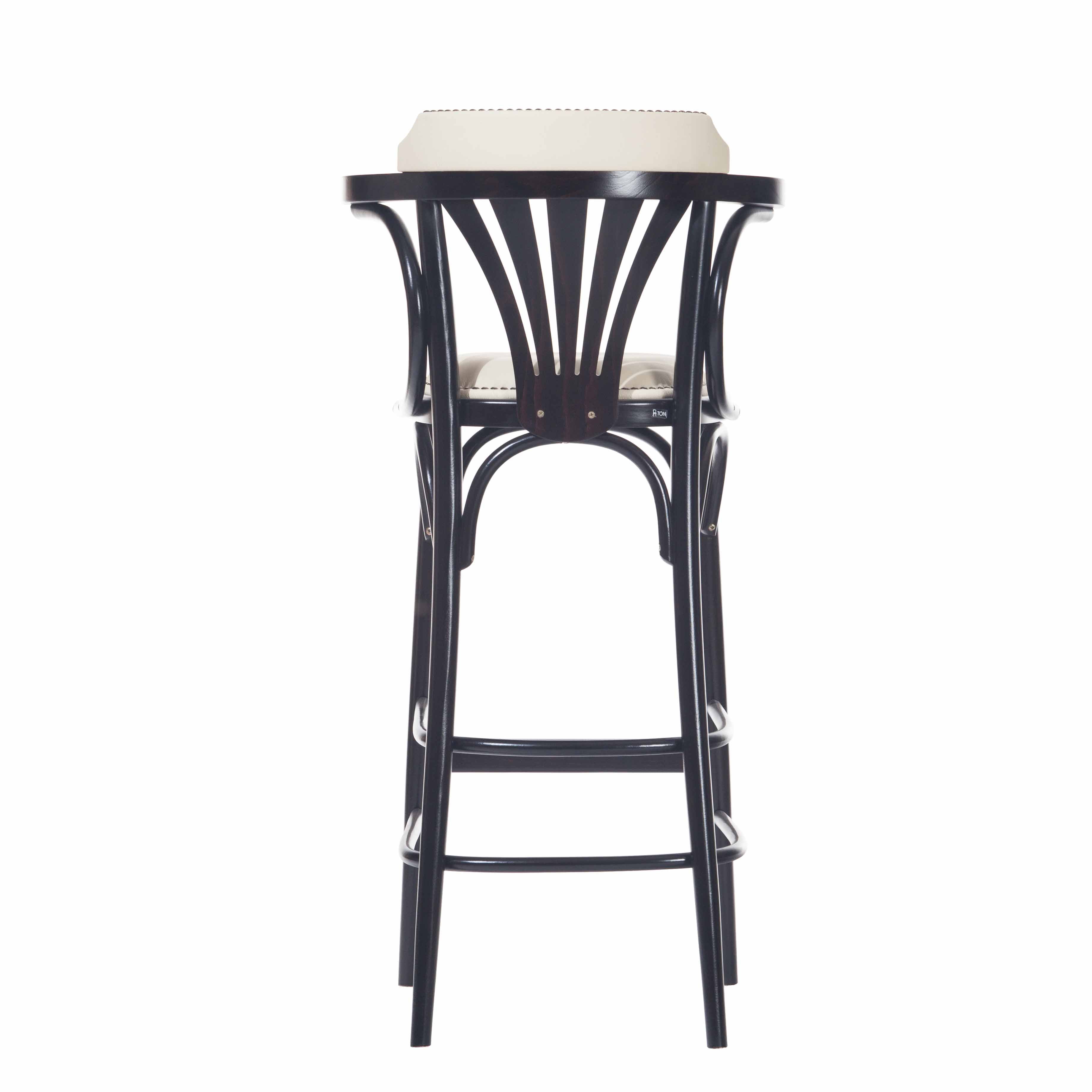 The TON Barstool 135 is a black wooden barstool with a curved backrest, cushioned seat, and sleek armrests. It features an elegant arch beneath the seat for a sophisticated appearance.