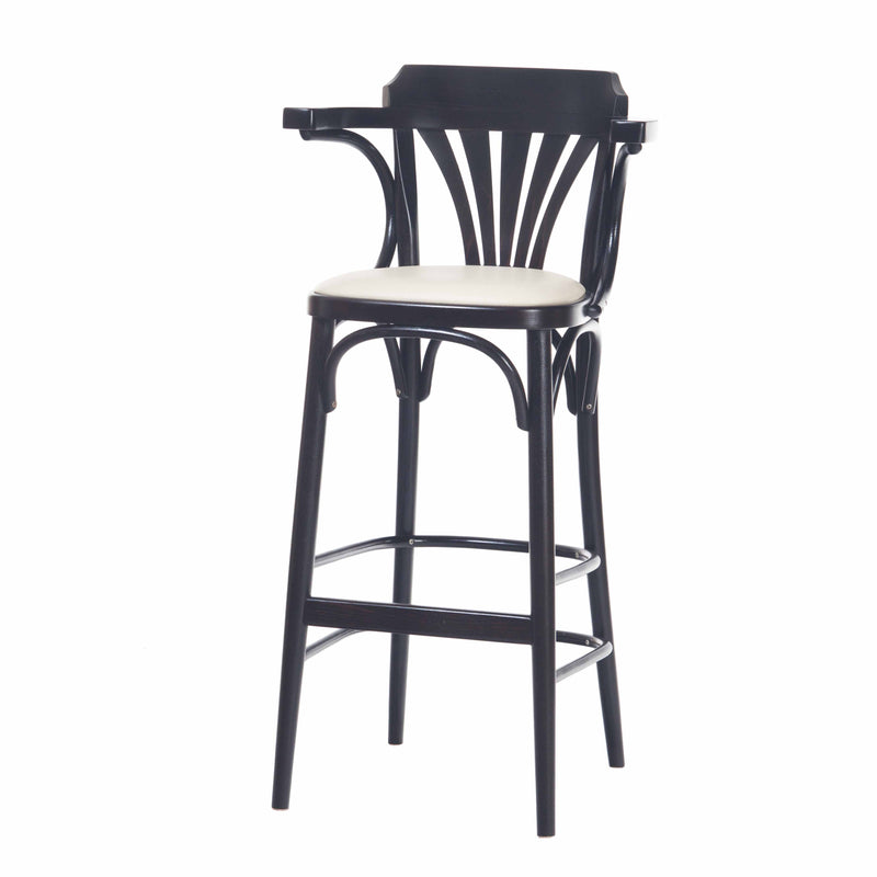 The Barstool 135 by TON boasts a sleek black design with a high backrest and curved decorative slats, a beige cushioned seat, footrests on the front and sides, and is crafted from durable plywood for lasting style.