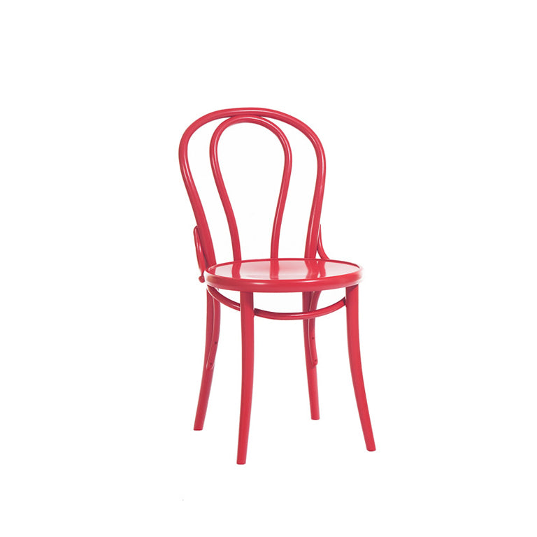 The Chair 18 by TON is a red wooden dining chair crafted from Beech, featuring a bent rod backrest and circular seat, standing elegantly against a plain white background.