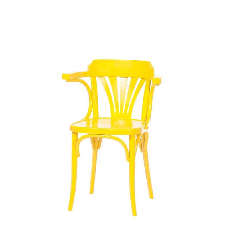 The TON Armchair 24 is a vibrant yellow chair with a curved, cut-out fan backrest, smooth rounded arms, and sturdy legs, set against a plain white background.