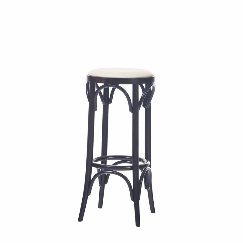 The Barstool 73 by TON features a tall, beech wooden frame with slightly curved black legs and circular footrests. It has a white, round cushioned seat showcasing elegant upholstery and stands against a plain white backdrop.