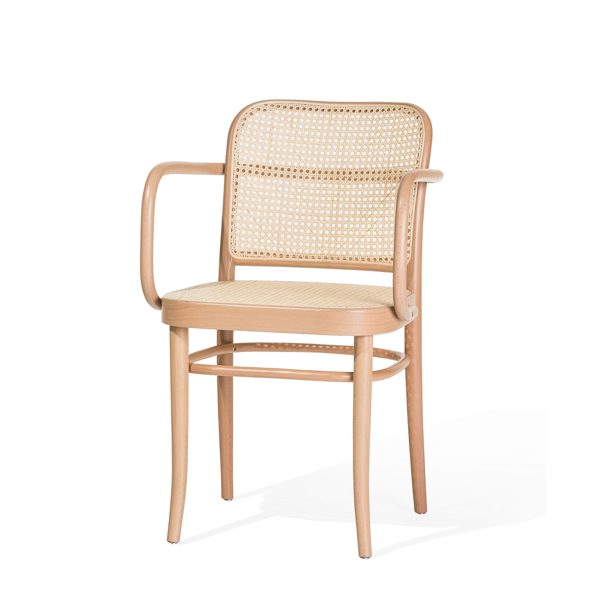 The TON Armchair 811 features a light brown finish with a woven rattan backrest and seat. Its elegant Art Nouveau style boasts curved arms in a classic design reminiscent of Josef Hoffmann, standing gracefully on four simple legs.