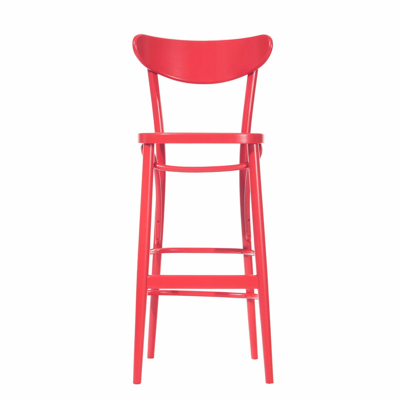 The Barstool Banana by TON features a vibrant red hue, a high backrest, and footrest. It boasts sturdy support from its beech frame and offers comfort with its upholstered seat, all set against a plain white background.