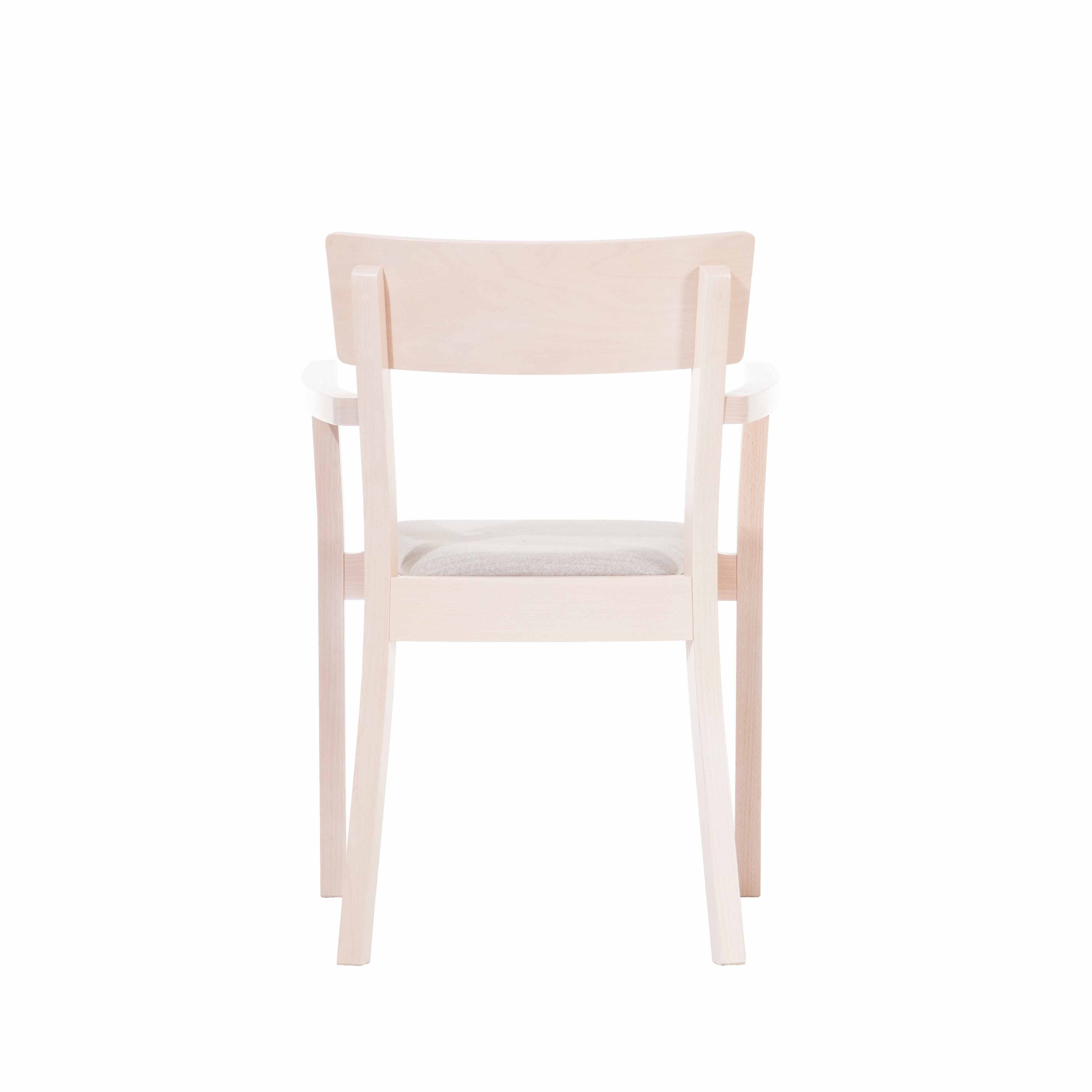 The TON Armchair Bergamo is a light beech chair with beige cushions, minimalist design, curved armrests and legs, and a rectangular backrest. It is viewed from the back against a white background.