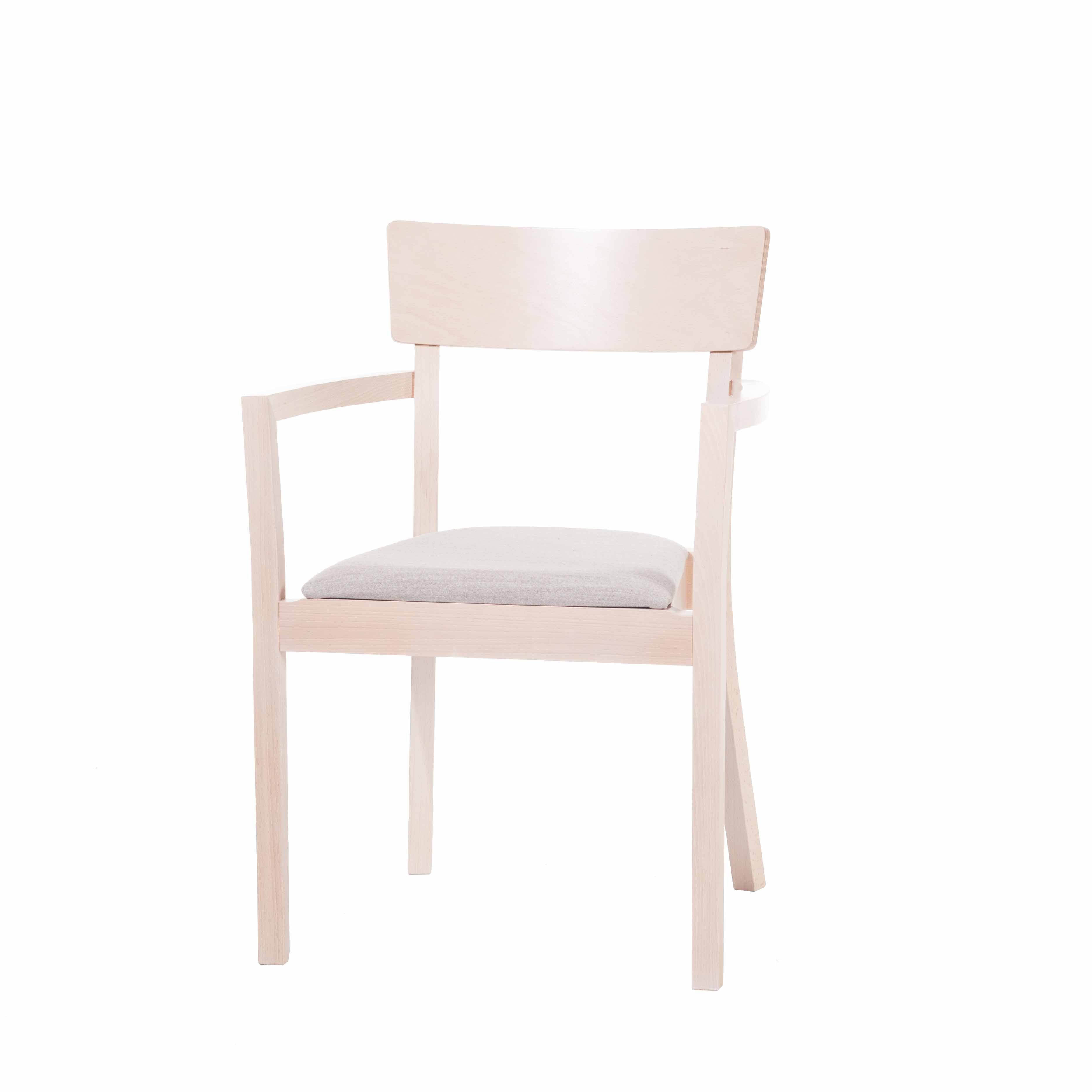 The Armchair Bergamo by TON features a beech wooden frame with light-colored arms and legs, a straight backrest, and a gray cushioned seat. Its minimalist design highlights clean lines and natural wood grain variability.