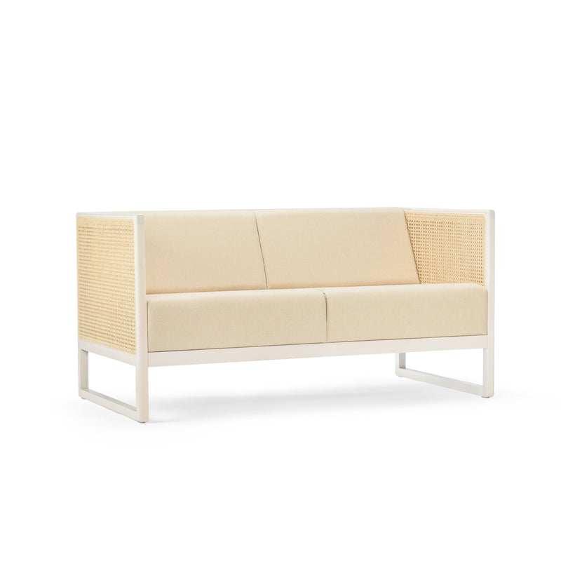 The TON Casablanca Sofa showcases a modern, minimalist design with a wooden frame and cane weave armrests. Set against a plain white background, its clean lines and beige color offer a contemporary elegance, complementing the Casablanca set perfectly.