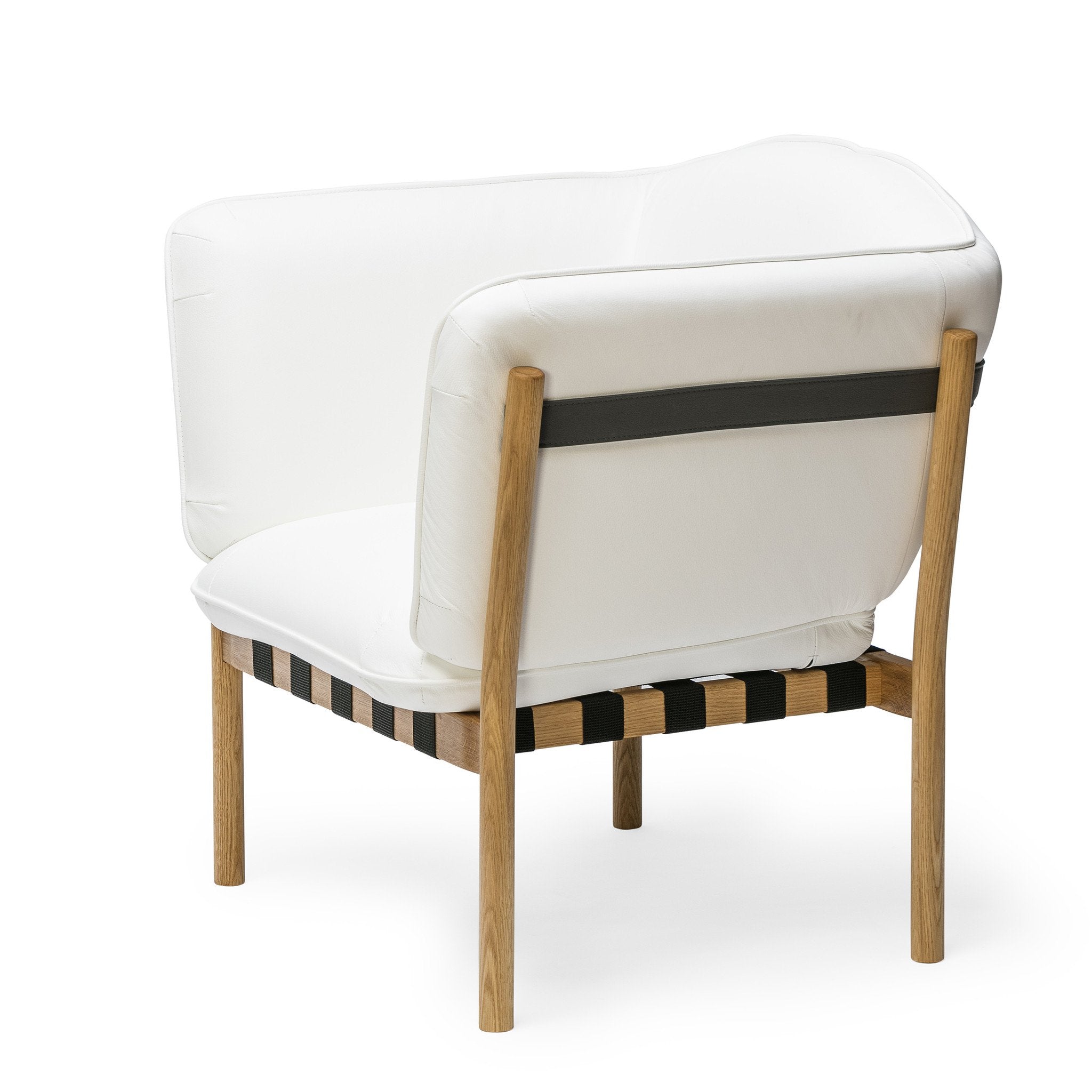 The Dowel Lounge Chair by TON features a white cushioned seat with wooden legs and a woven base. Its modern, minimalist design includes a supportive backrest and sleek armrests, providing comfort and style with its contemporary upholstery for optimal relaxation.