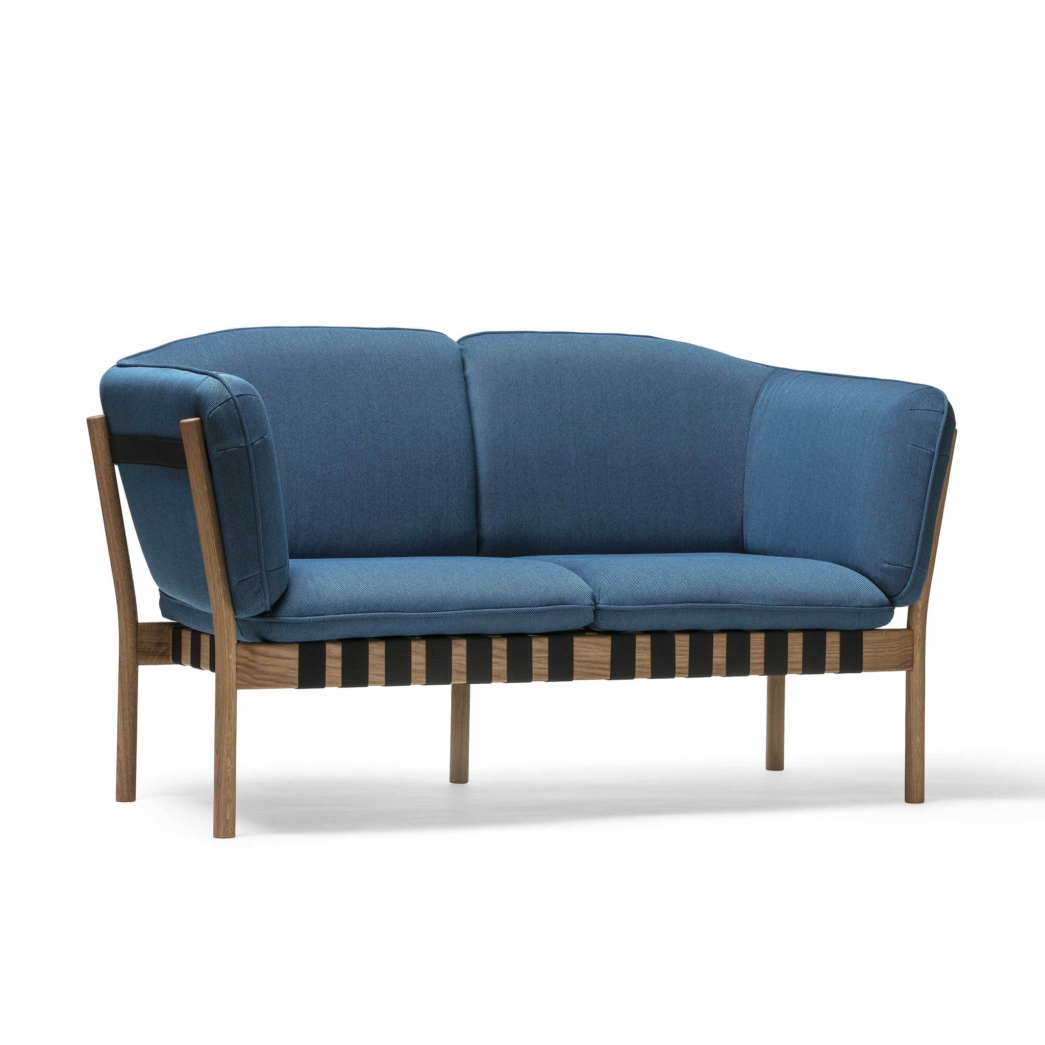 The Dowel Two-Seater by TON is a modern living room settee with a wooden frame and blue cushions, featuring curved armrests and a supportive backrest for comfortable seating in a sophisticated and stylish design.