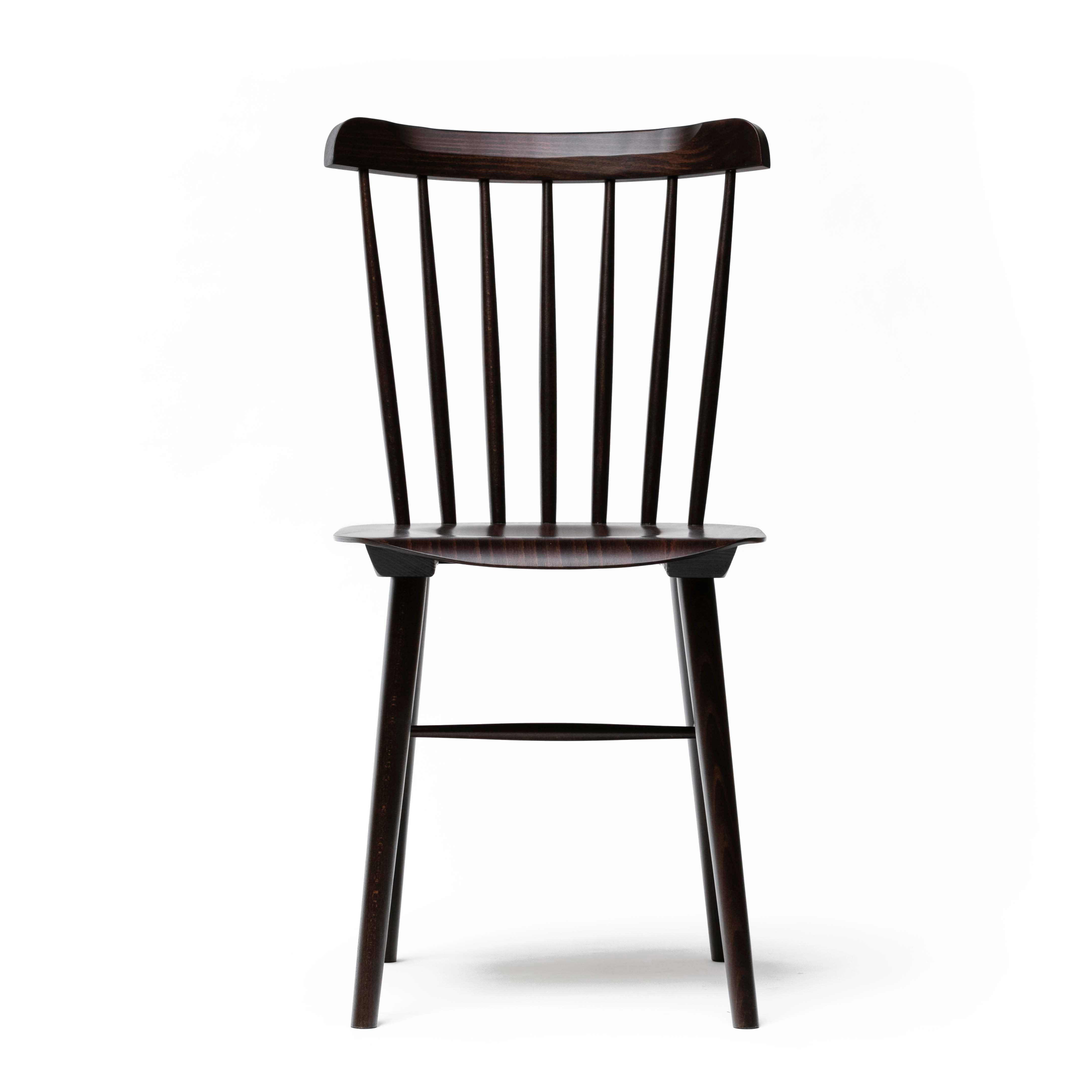 The TON Chair Ironica, featuring vertical backrest slats and straight legs, embodies a retro style against a plain white background.