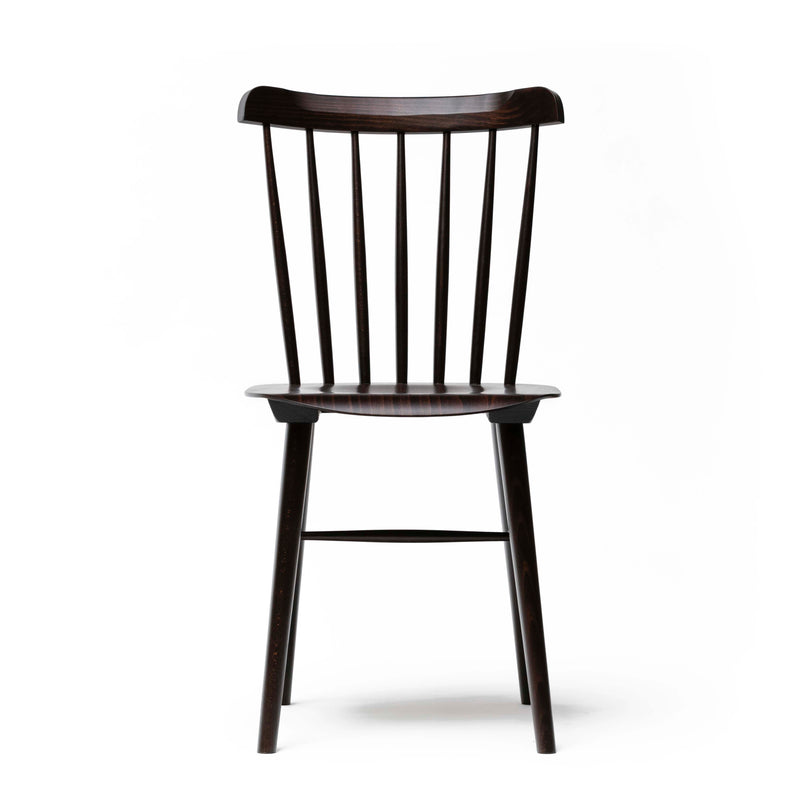 The TON Chair Ironica, featuring vertical backrest slats and straight legs, embodies a retro style against a plain white background.