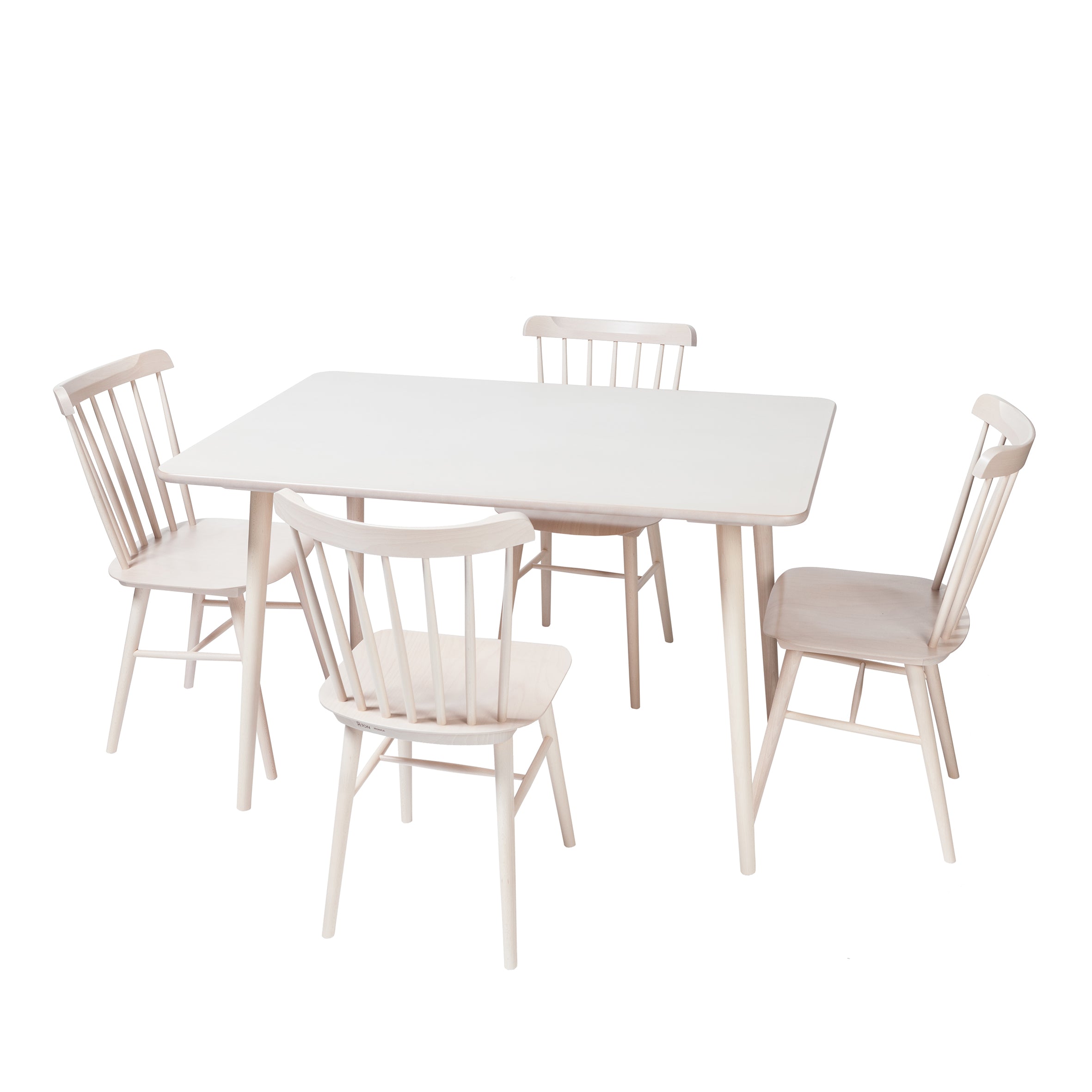 The Table Ironica by TON is a retro-style dining set with a light wooden, solid beech rectangular table with tapered legs. It includes four matching chairs featuring rounded backs with vertical slats, all elegantly presented against a white background.