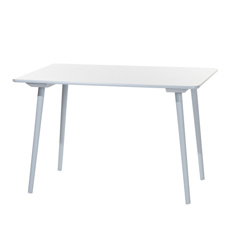 The Table Ironica by TON, a minimalist white rectangular table with four slender, slightly angled solid beech legs, exudes a retro style against a plain white background.