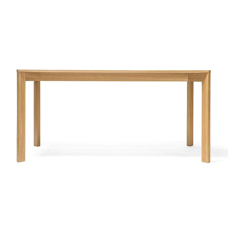 The Lasu table by TON features a simple rectangular design with a light natural veneer finish. Its equipped with four straight legs and a flat top, ideal for minimalist conference rooms due to its sleek design and lack of visible adornments.