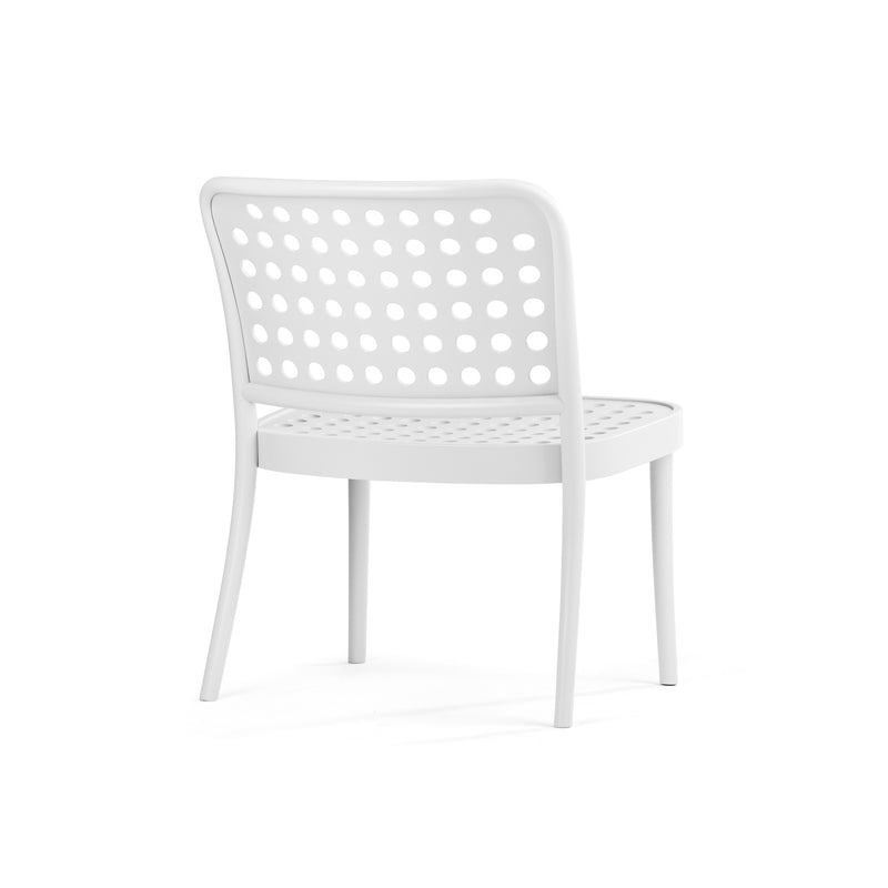 The Lounge Chair 822 by TON is a modern, minimalist white chair featuring a perforated backrest and seat. Viewed from an angle against a plain white backdrop, its sleek design and four straight legs embody Scandinavian minimalism and innovative artistry of TONDesigner Studio.