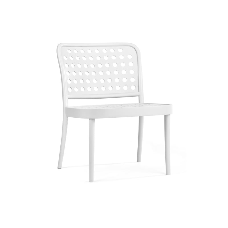 The Lounge Chair 822 by TON exemplifies Scandinavian minimalism with its white design, perforated backrest, and seat with circular grid-patterned holes. Crafted using wood-bending technology, the chair features four legs and a sleek style against a white background.