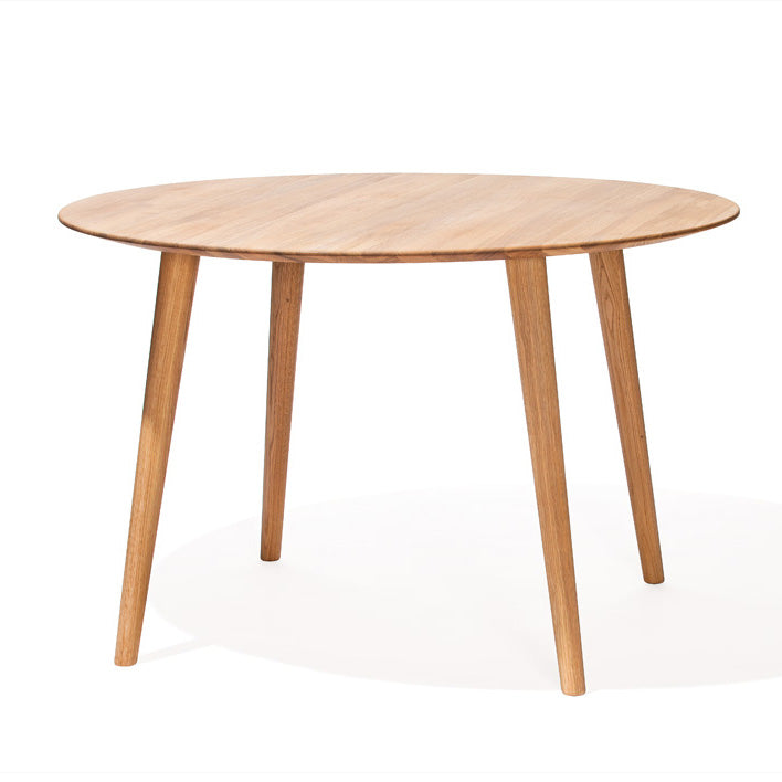 The Table Malmö 707 by TON features a Scandinavian design with a large tabletop, light brown finish, and four subtly tapered legs, ideal for modern settings.