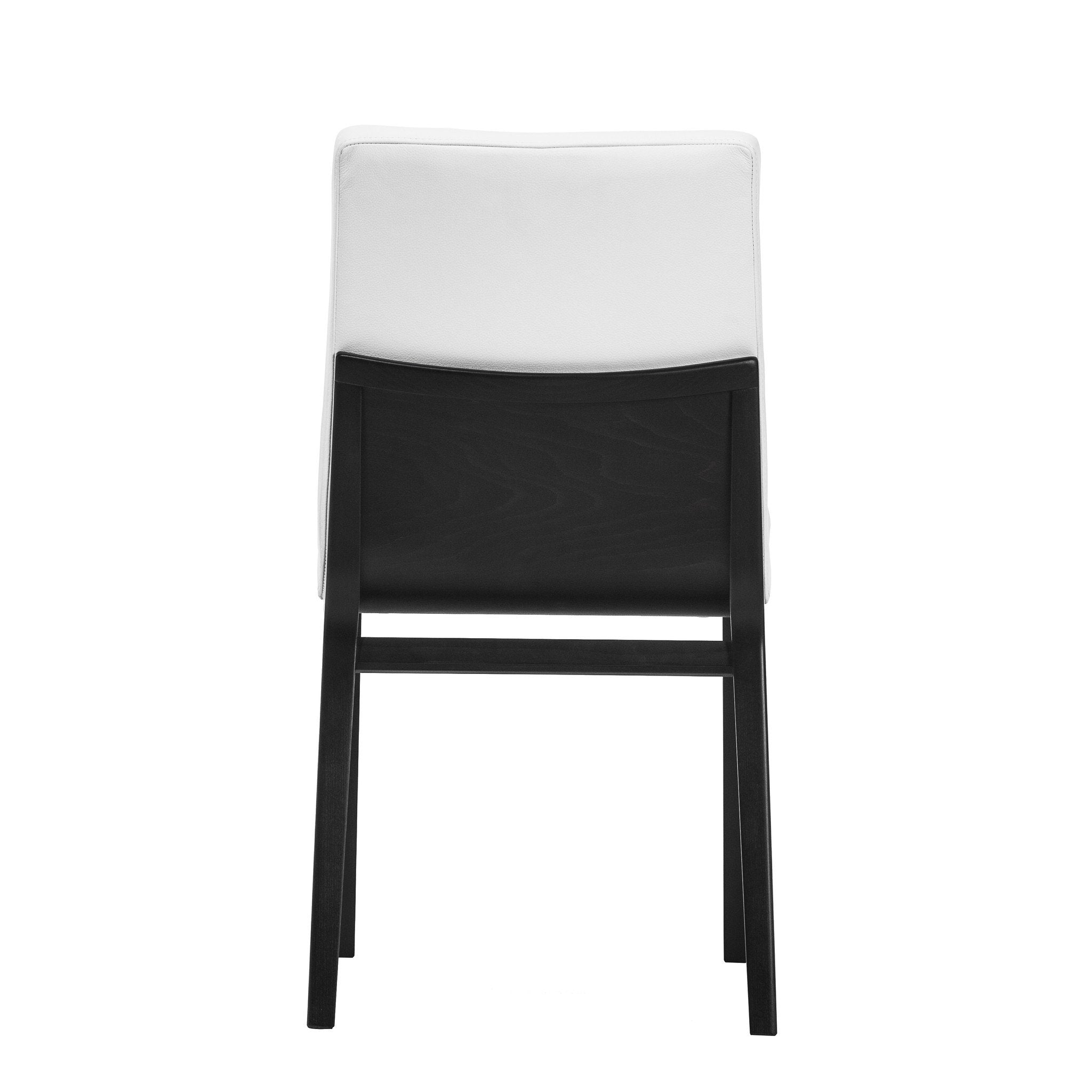 Rear view of the Chair Moritz by TON, showcasing a white upholstered seat and black wooden legs. This premium product highlights a simple, minimalist design with clean lines, set against a white backdrop.