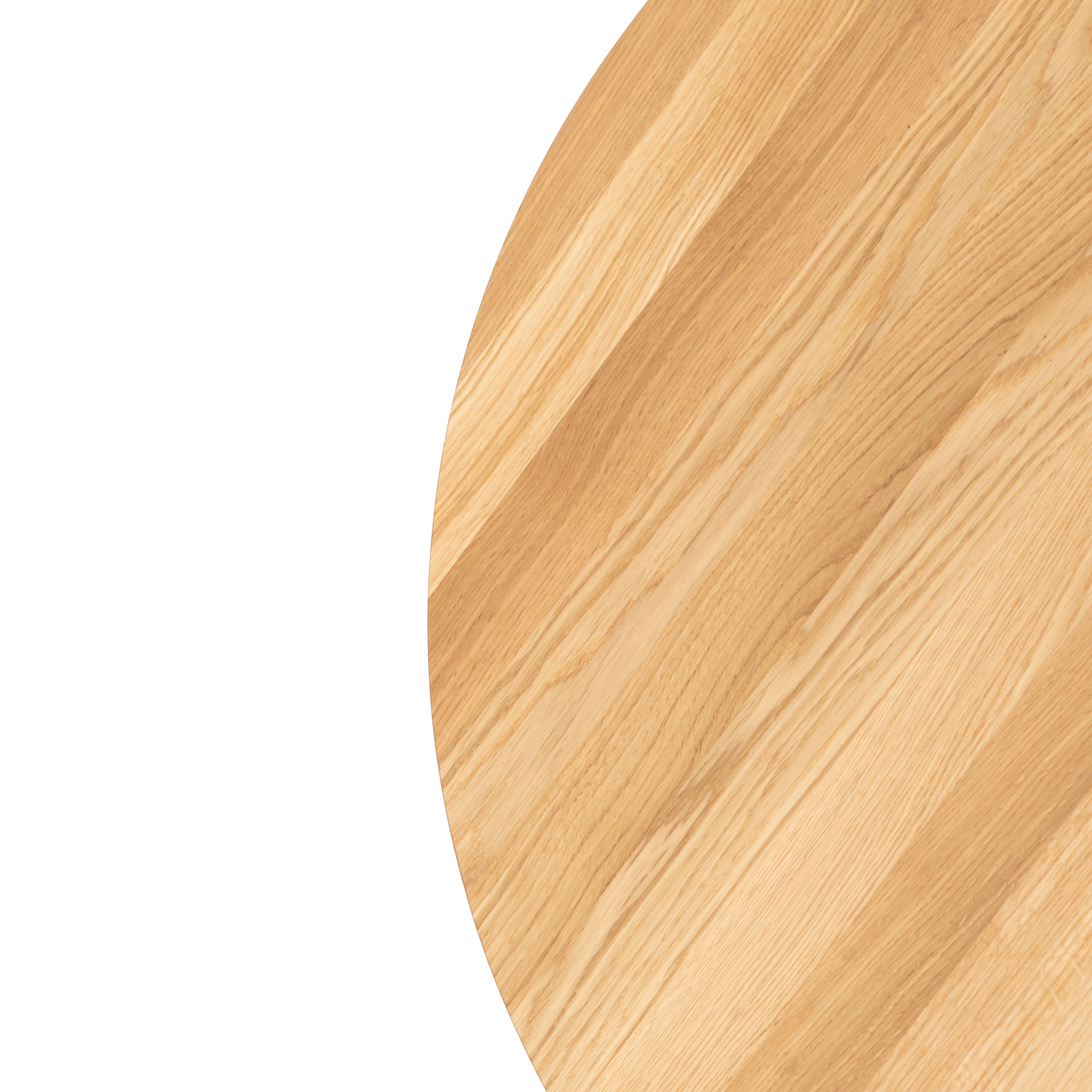A close-up of the P.O.V. Table 460 by TON features an elegant round, light wooden surface with distinct grain patterns against a white background, covering the right half of the image.