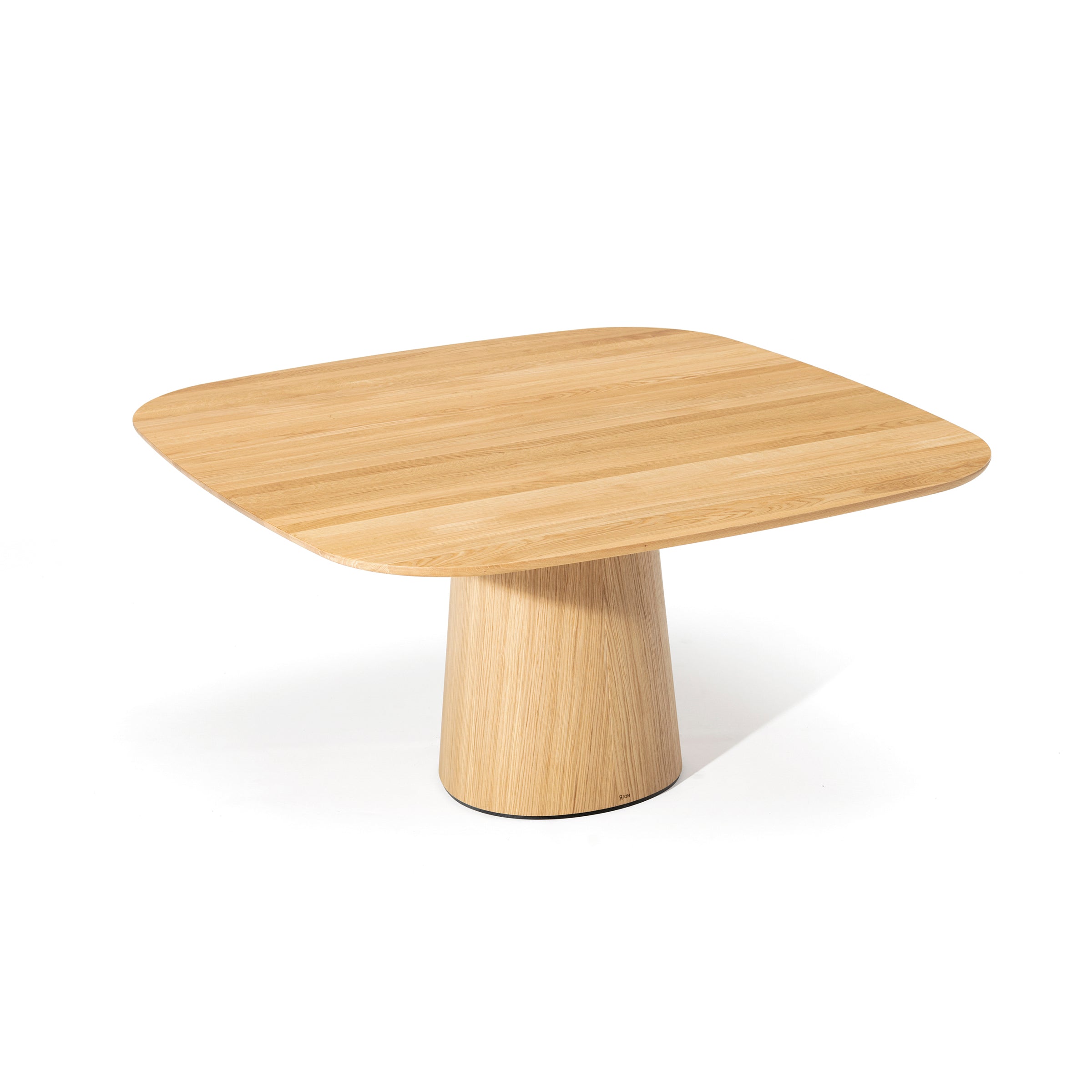 The P.O.V. Table 462 by TON is a modern square wooden coffee table with smooth, rounded edges and an organically shaped base. Its natural wood grain adds texture, while the light minimalist design complements a white backdrop.