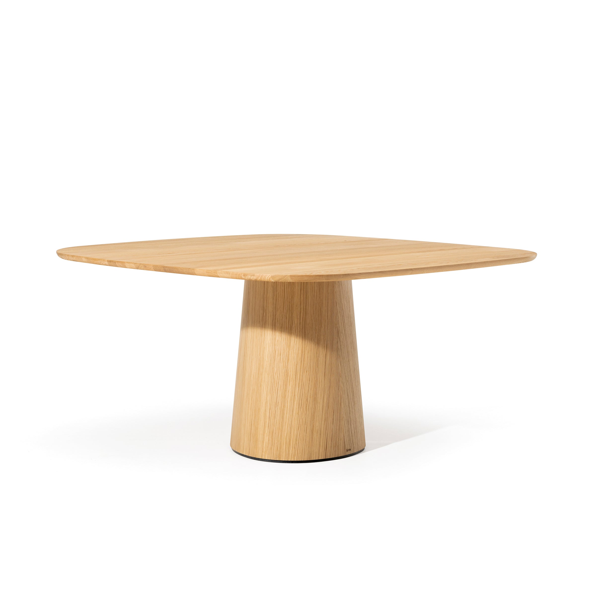 The P.O.V. Table 462 by TON is a wooden table with a square top and an organically shaped conical base. Its minimalist design and light, natural wood finish beautifully contrast a white backdrop.