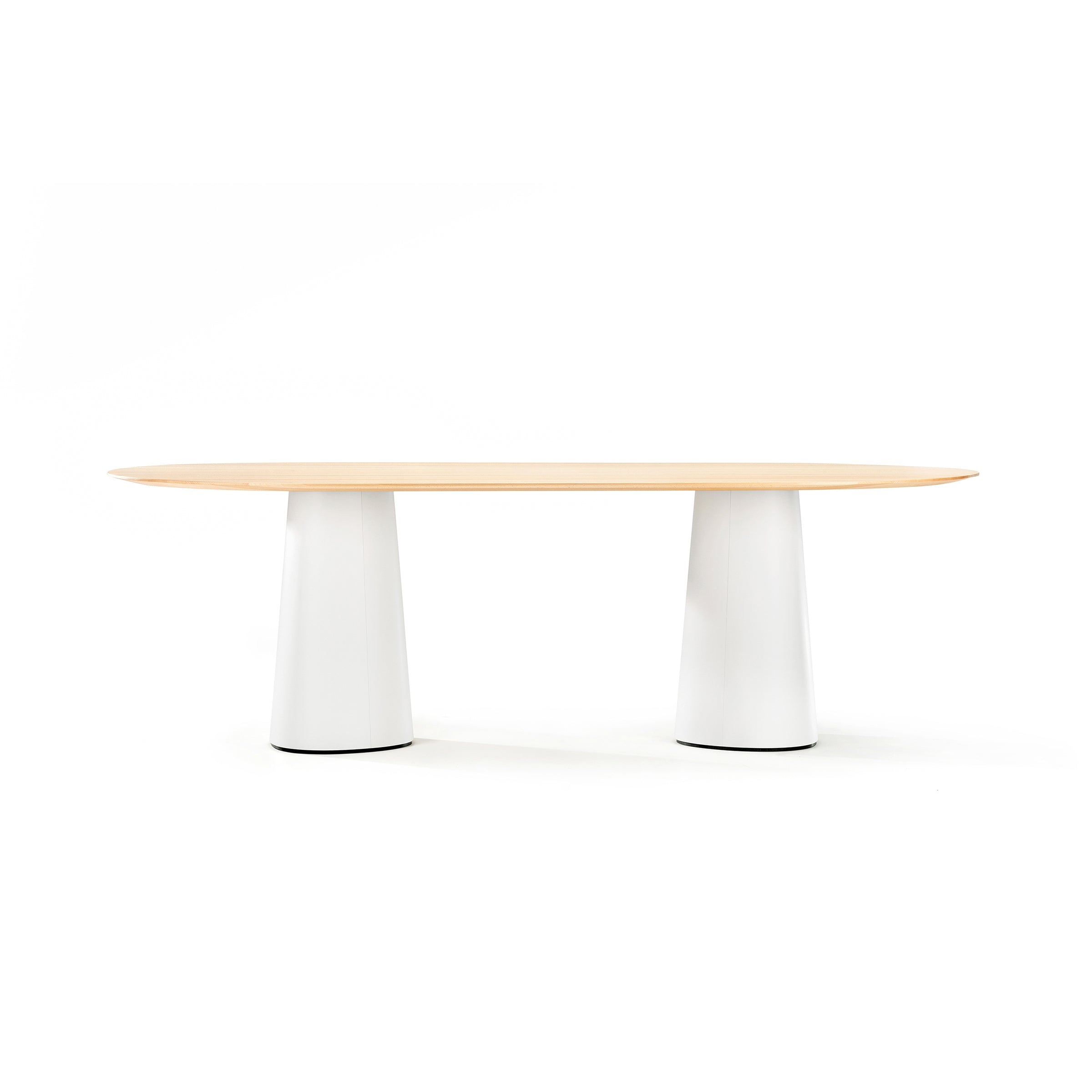 The P.O.V. Table 464 by TON showcases a minimalist design with a light wooden top and an organic base featuring two cylindrical white pedestal legs, creating a sleek, modern appearance against a simple white background.
