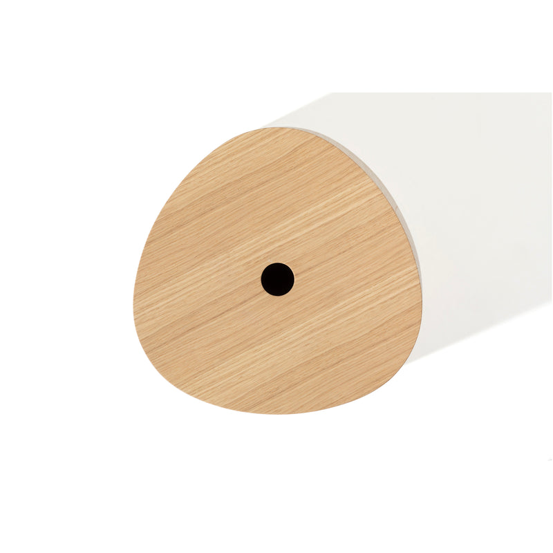 A top view of the P.O.V. Stool by TON displays its round, wooden cylindrical form with a smooth, light wood finish. The center has a small black dot like a hole. It casts a subtle shadow on a white background.