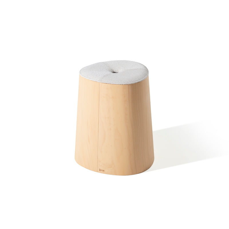 The P.O.V. Stool Upholstered by TON features a conical shape with a light grey cushioned seat, crafted from American walnut for a natural finish, combining minimalistic style and functionality.