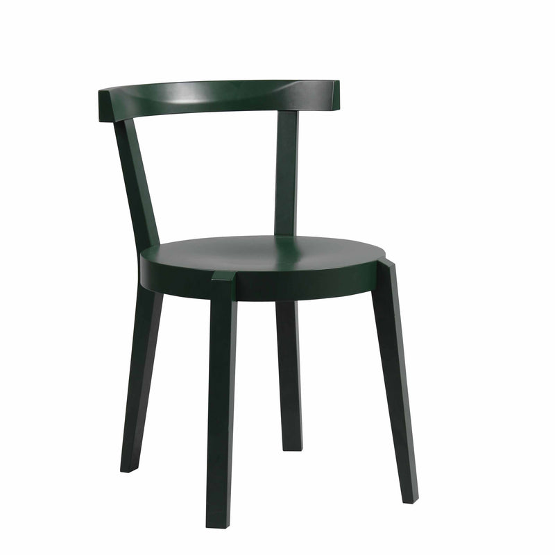 The Chair Punton by TON is a modern dining chair featuring a dark green finish, four legs, and a circular seat with a curved backrest. Its minimalist design showcases clean lines and angles reminiscent of classic bent furniture, standing out beautifully against a plain white background.