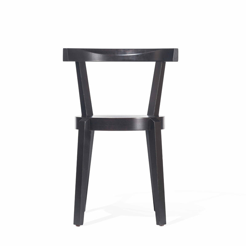 The modern Chair Punton by TON showcases a sleek black design with a straight backrest, gently angled legs, and a flat seat, artfully set against a plain white background.