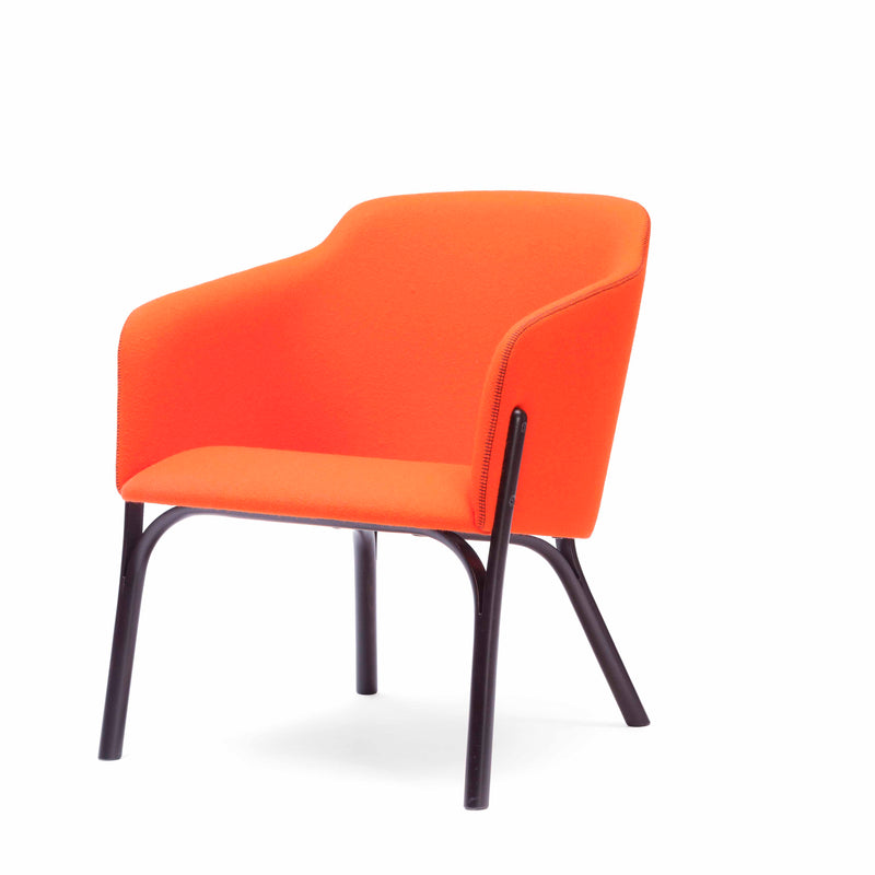 The TON Lounge Chair Split features striking orange upholstery with a sophisticated curved backrest and armrests, set on sleek black metal legs. Its modern design and higher backrest create a stunning contrast against the white background.