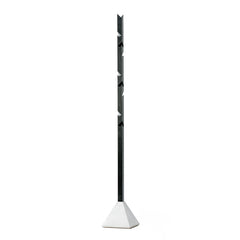 The Tee by TON is a modern, minimalist coat rack with an angular metal design that stands vertically on a sleek oak and concrete base, featuring evenly spaced hooks.