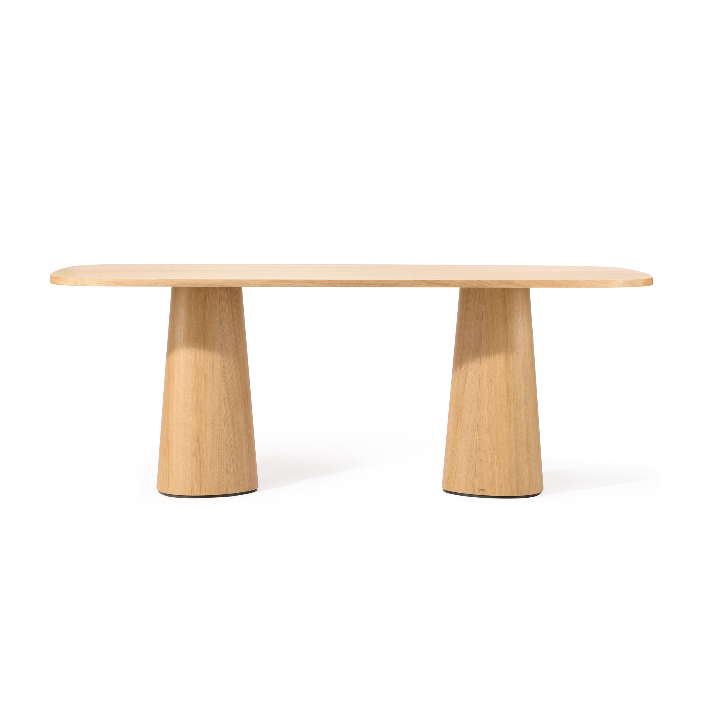 The P.O.V. Table 470 by TON boasts a modern, organic design with a smooth rectangular top crafted from light solid wood and supported by two wide conical legs. Its minimalist elegance shines against a plain white background.