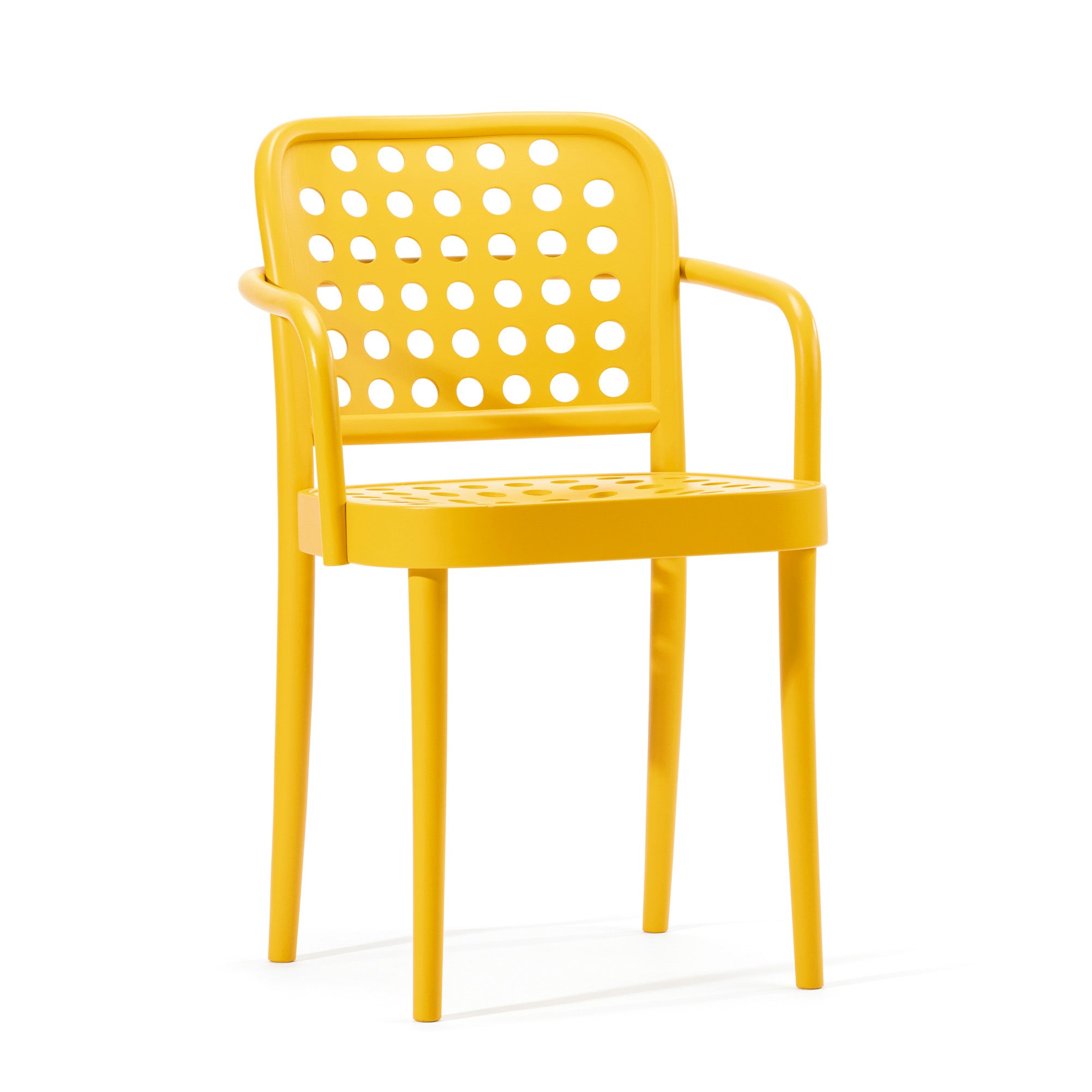 The Armchair 822 by TON highlights Scandinavian minimalism, with armrests, a yellow finish, smooth edges, and a perforated seat and backrest featuring circular holes. Its sleek aesthetic is complemented by four slender legs.